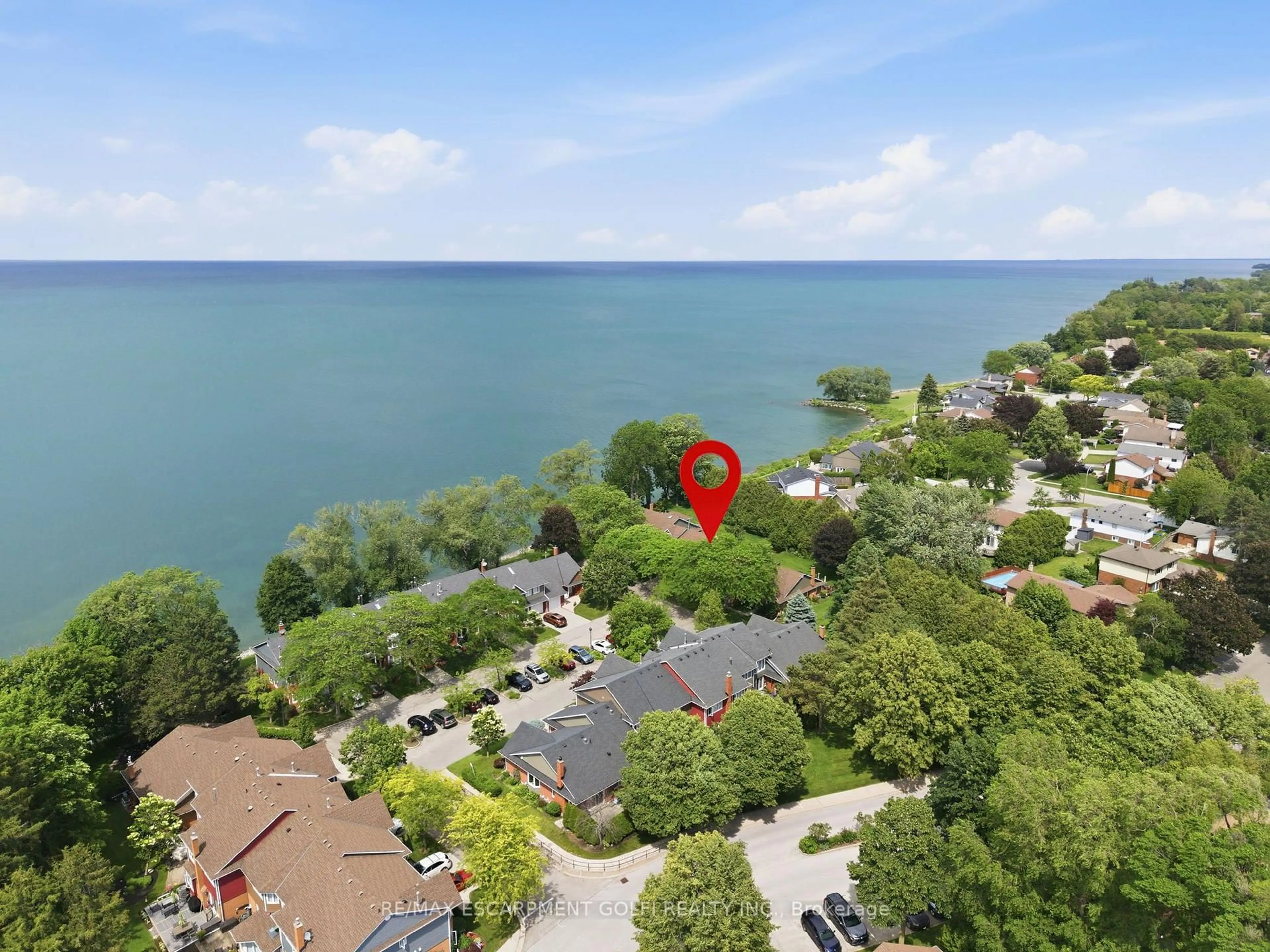 A pic from outside/outdoor area/front of a property/back of a property/a pic from drone, water/lake/river/ocean view for 375 Book Rd #7, Grimsby Ontario L3M 2M8