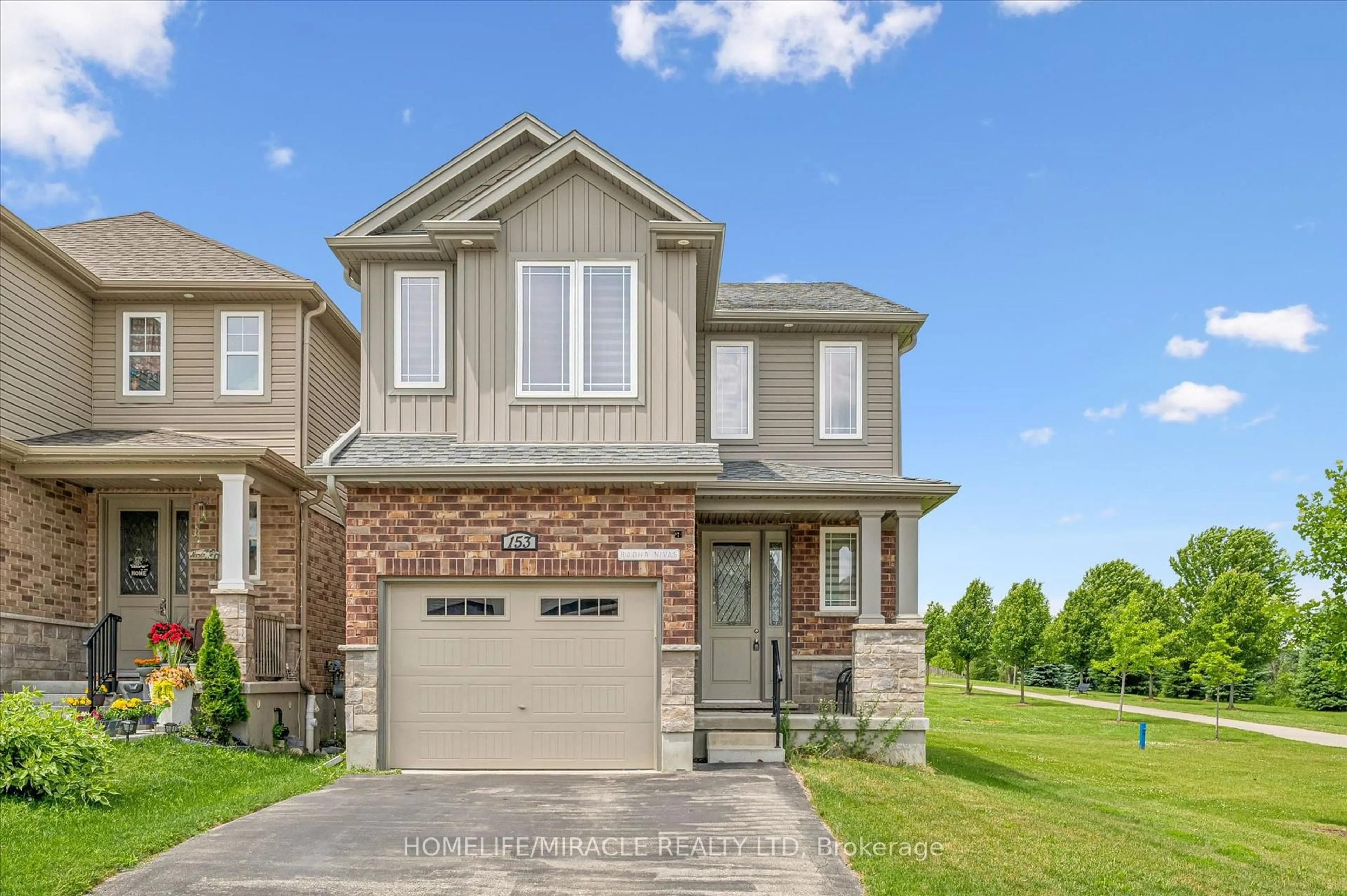 Home with brick exterior material, street for 153 Rivertrail Ave, Kitchener Ontario N2A 0K1