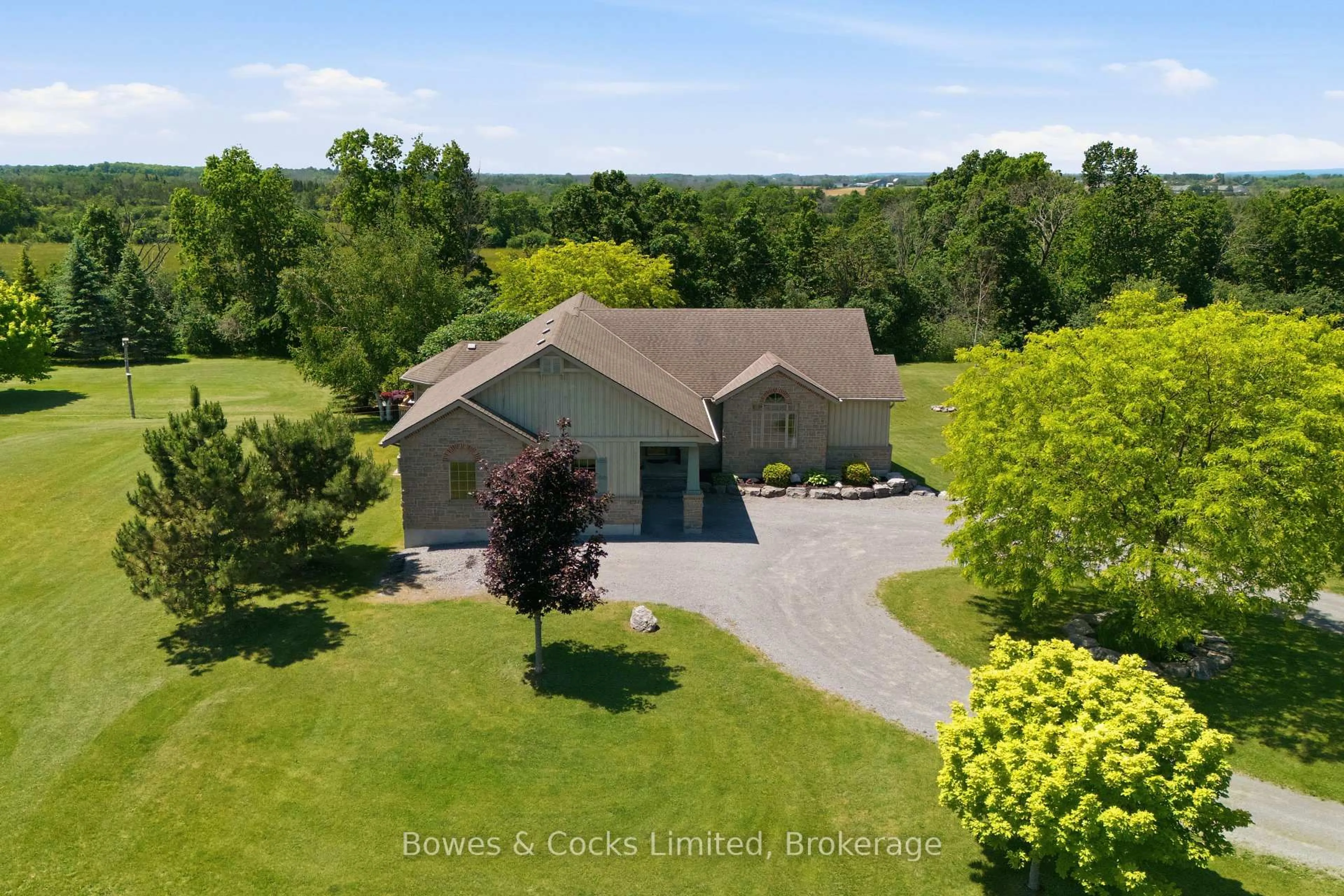 A pic from outside/outdoor area/front of a property/back of a property/a pic from drone, water/lake/river/ocean view for 301 Snider Rd, Prince Edward County Ontario K0K 1L0