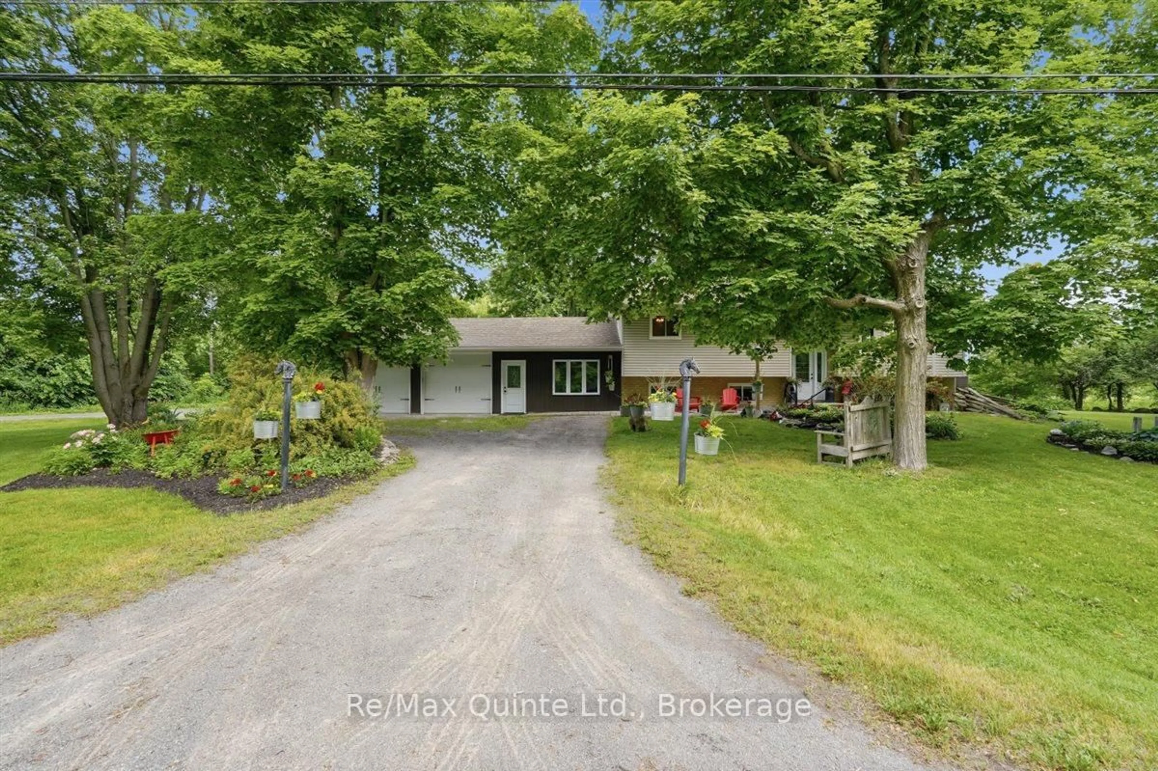 A pic from outside/outdoor area/front of a property/back of a property/a pic from drone, street for 608 Harrington Rd, Hastings Ontario K0K 2C0