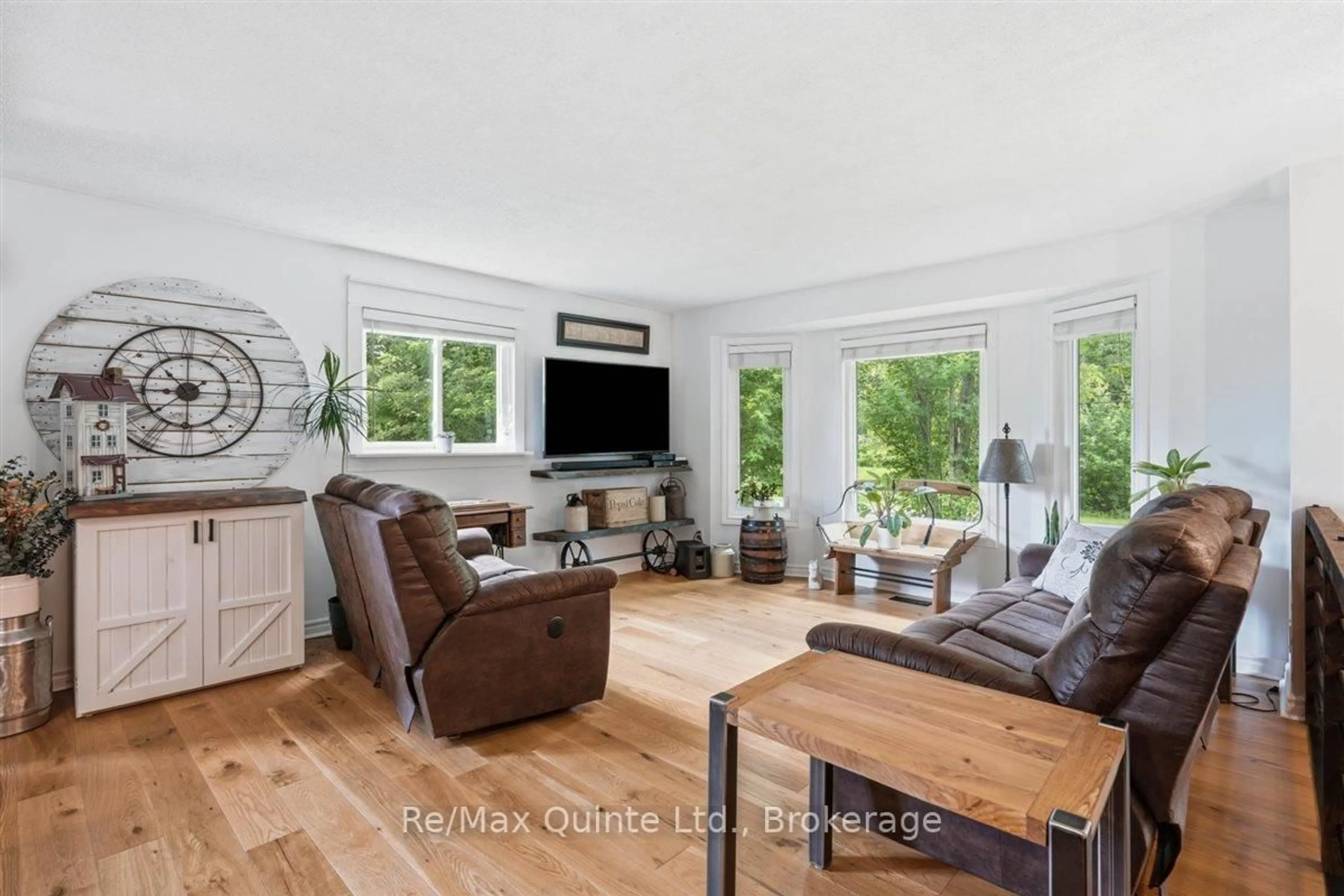 Living room with furniture, wood/laminate floor for 608 Harrington Rd, Hastings Ontario K0K 2C0