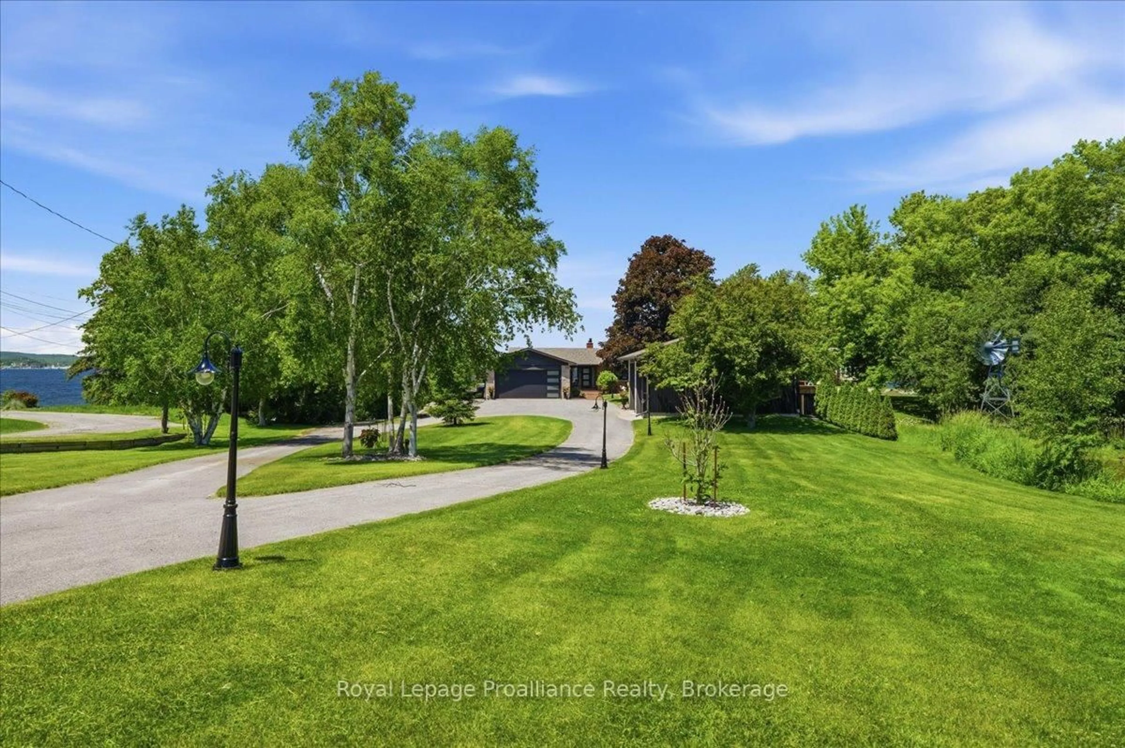 A pic from outside/outdoor area/front of a property/back of a property/a pic from drone, unknown for 2728 County Road 3, Prince Edward County Ontario K0K 1L0