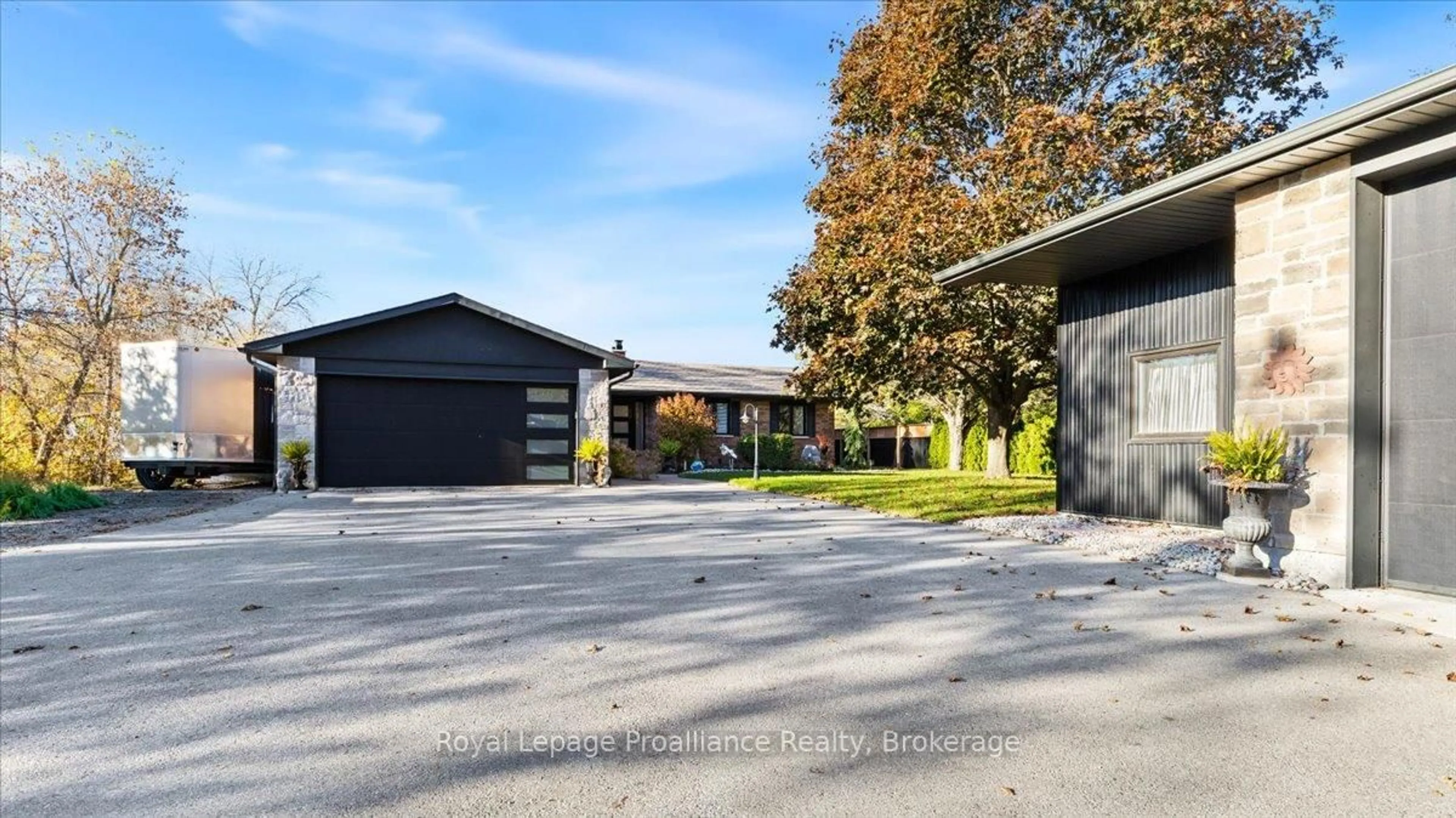 A pic from outside/outdoor area/front of a property/back of a property/a pic from drone, street for 2728 County Road 3, Prince Edward County Ontario K0K 1L0