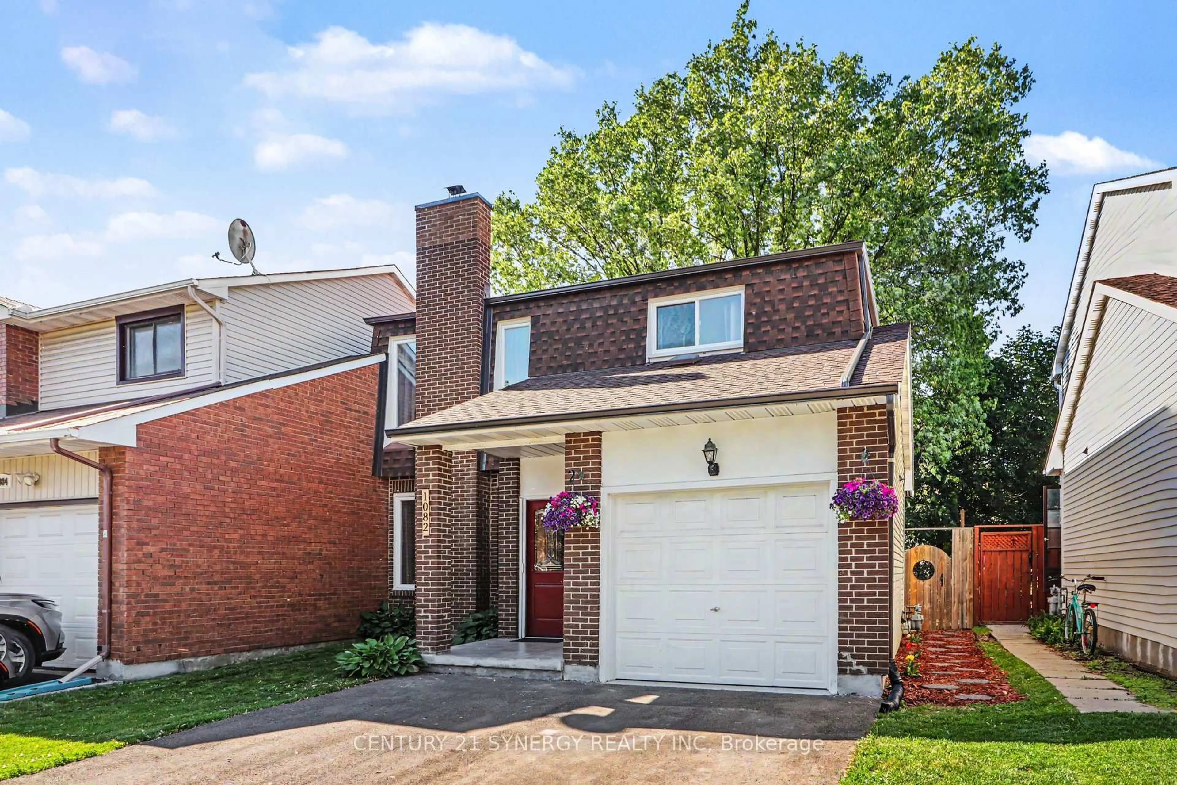 Home with brick exterior material, street for 1082 Taffy Lane, Ottawa Ontario K1C 1Y5