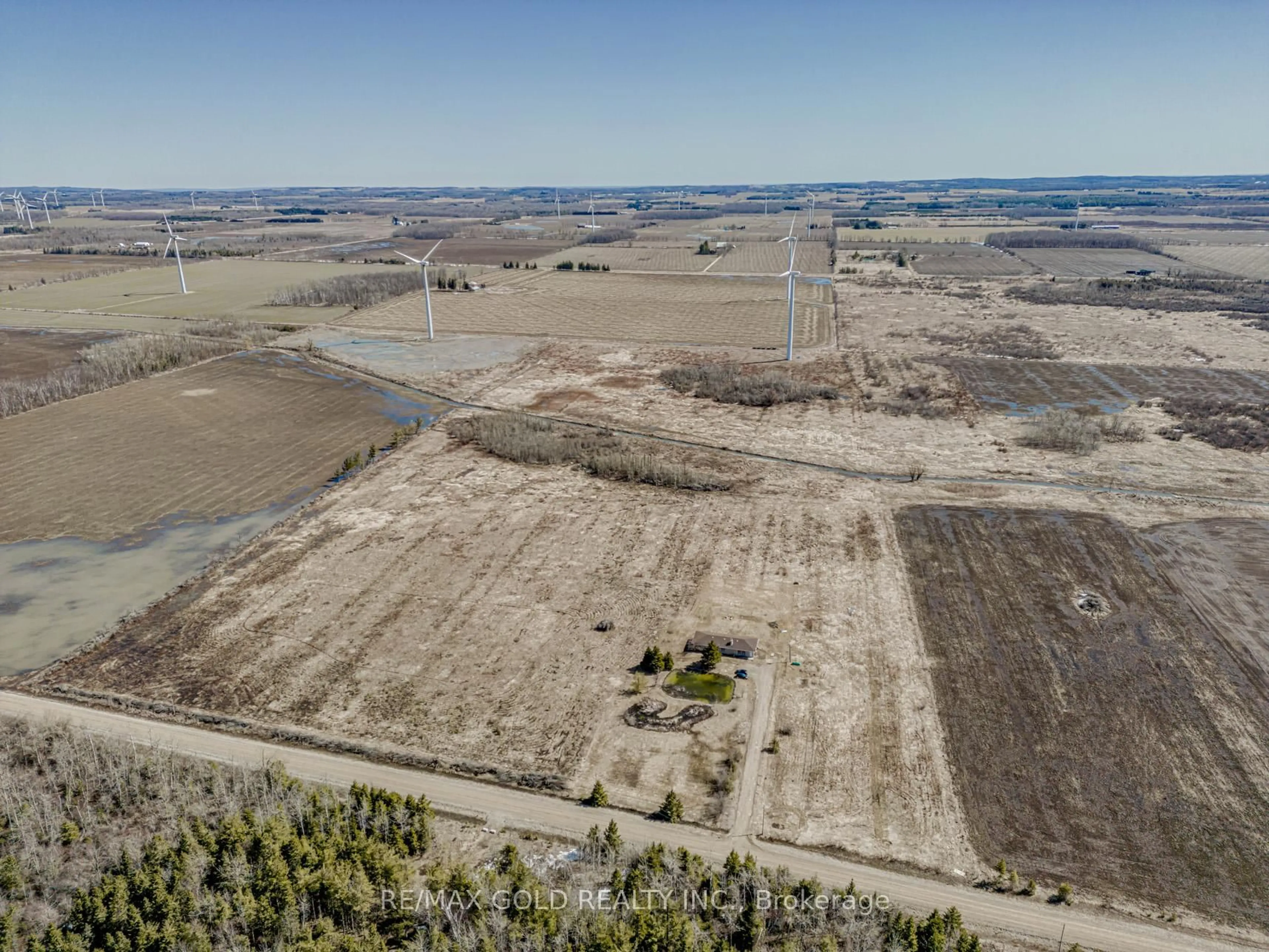 A pic from outside/outdoor area/front of a property/back of a property/a pic from drone, water/lake/river/ocean view for 255505 9th Line, Amaranth Ontario L0N 1S5