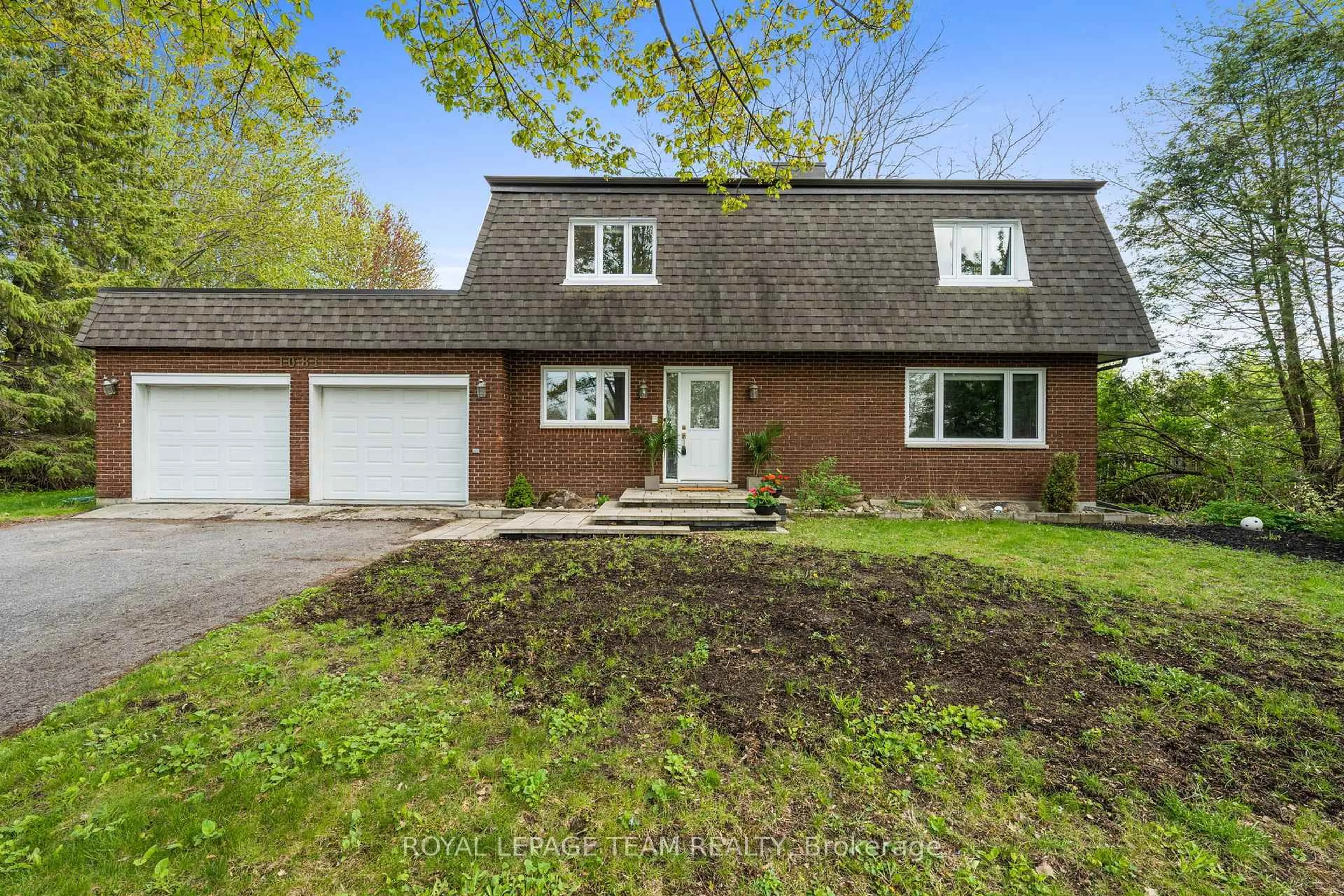 A pic from outside/outdoor area/front of a property/back of a property/a pic from drone, street for 1081 Boucher Cres, Manotick Ontario K4M 1B3
