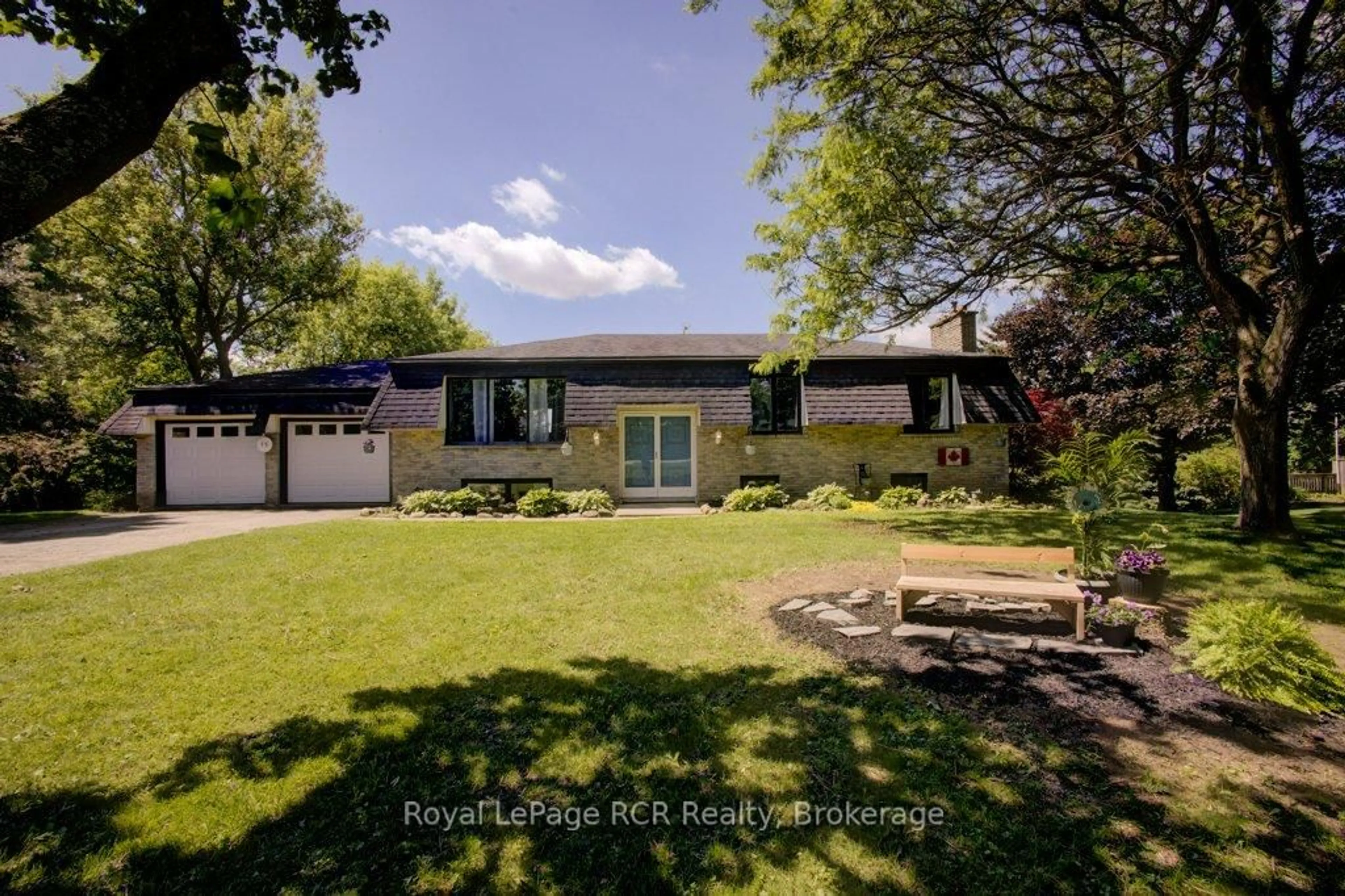 A pic from outside/outdoor area/front of a property/back of a property/a pic from drone, street for 15 Booth St, Mapleton Ontario N0G 2K0