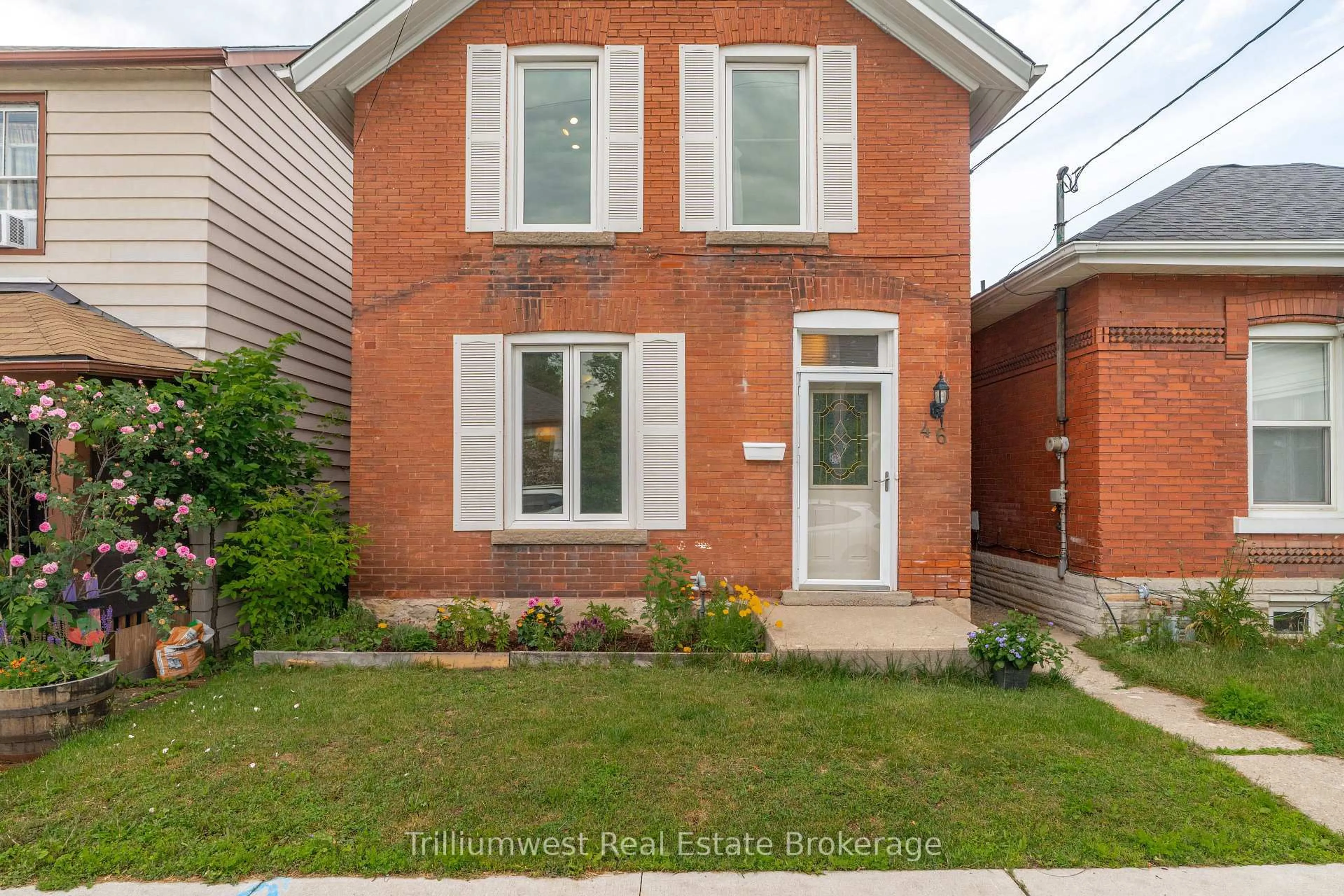 Home with brick exterior material, street for 46 Manitoba St, Guelph Ontario N1E 3B9