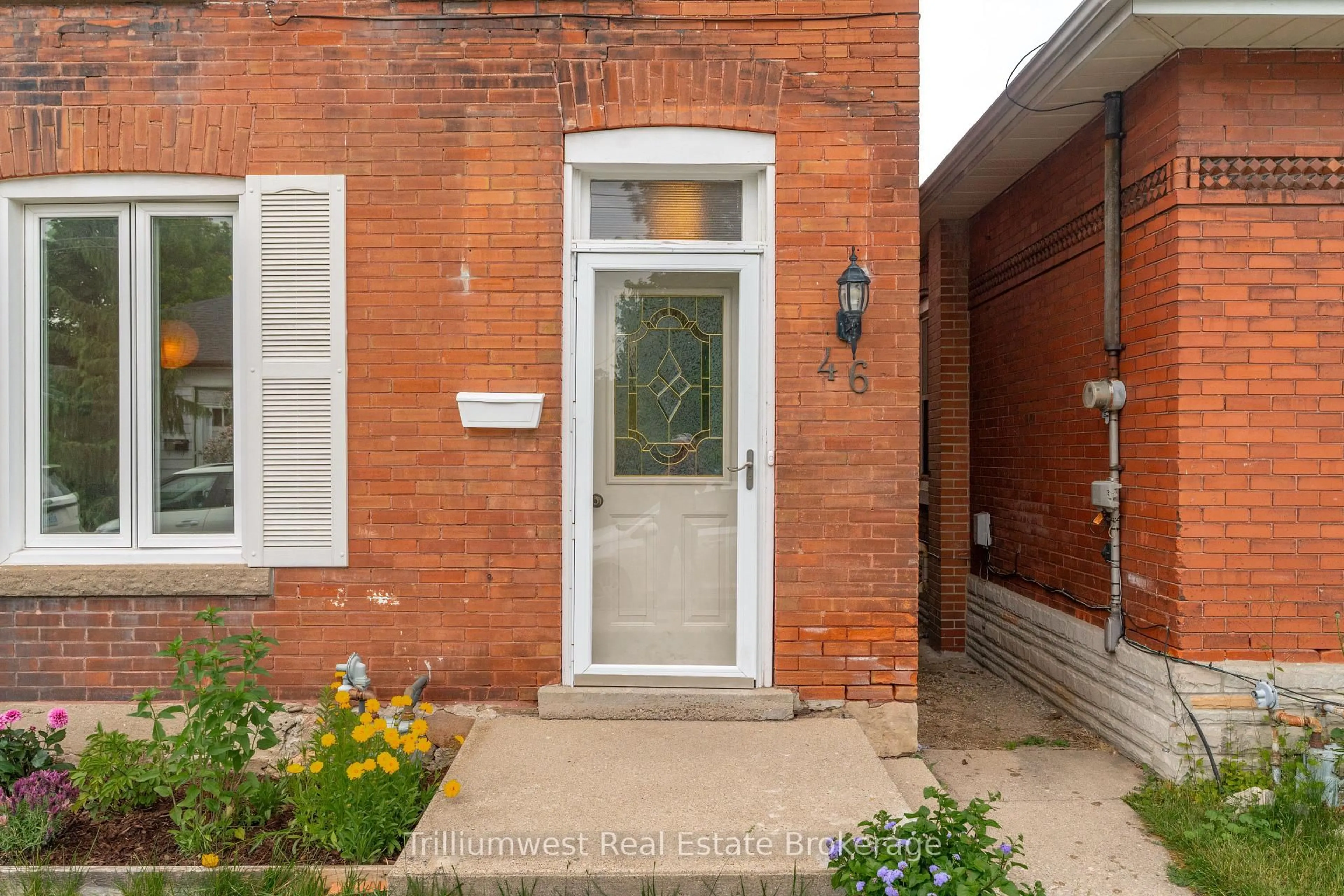 Home with brick exterior material, street for 46 Manitoba St, Guelph Ontario N1E 3B9