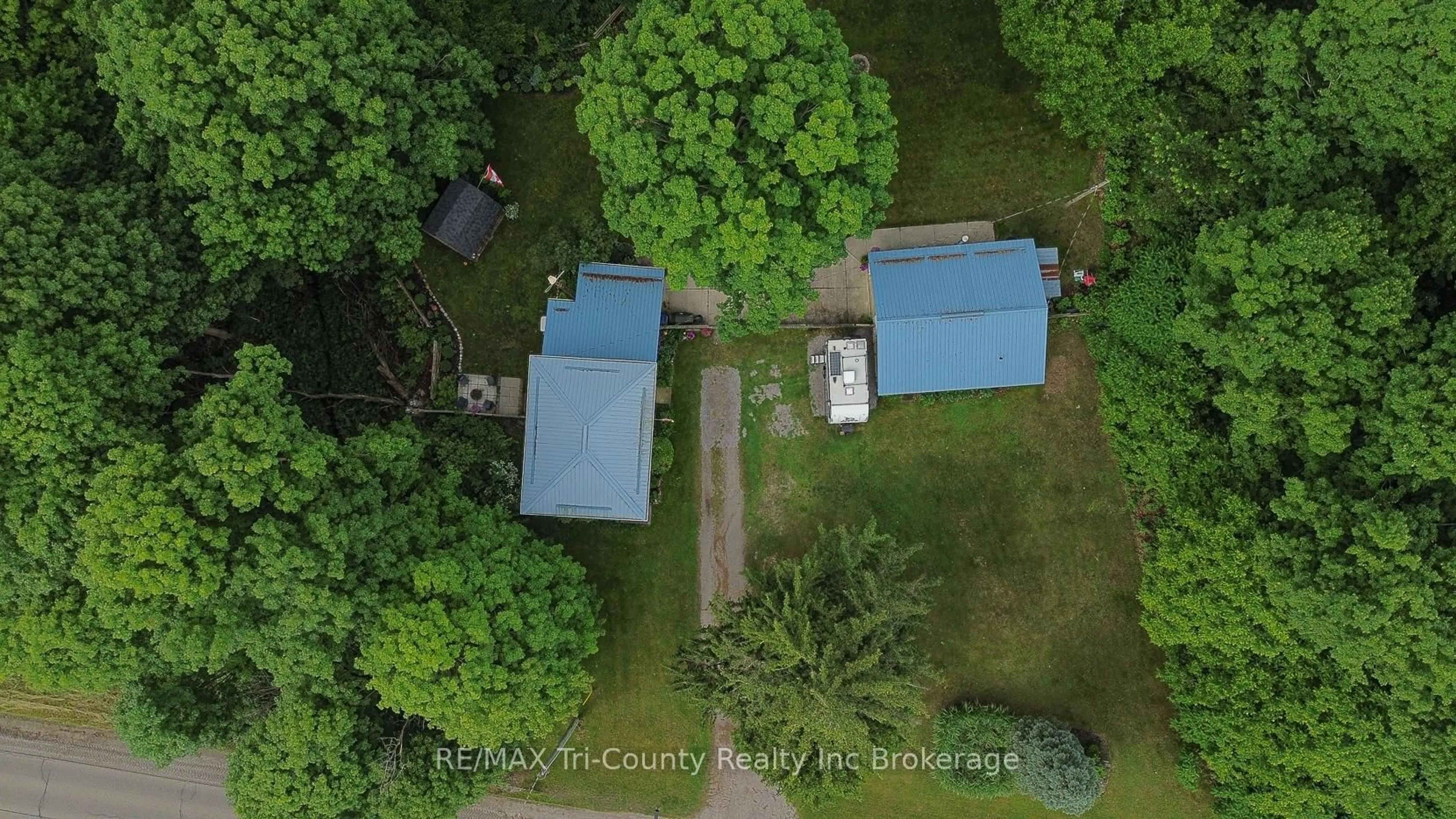 A pic from outside/outdoor area/front of a property/back of a property/a pic from drone, forest/trees view for 2875 59 Highway, Norfolk Ontario N0E 1G0