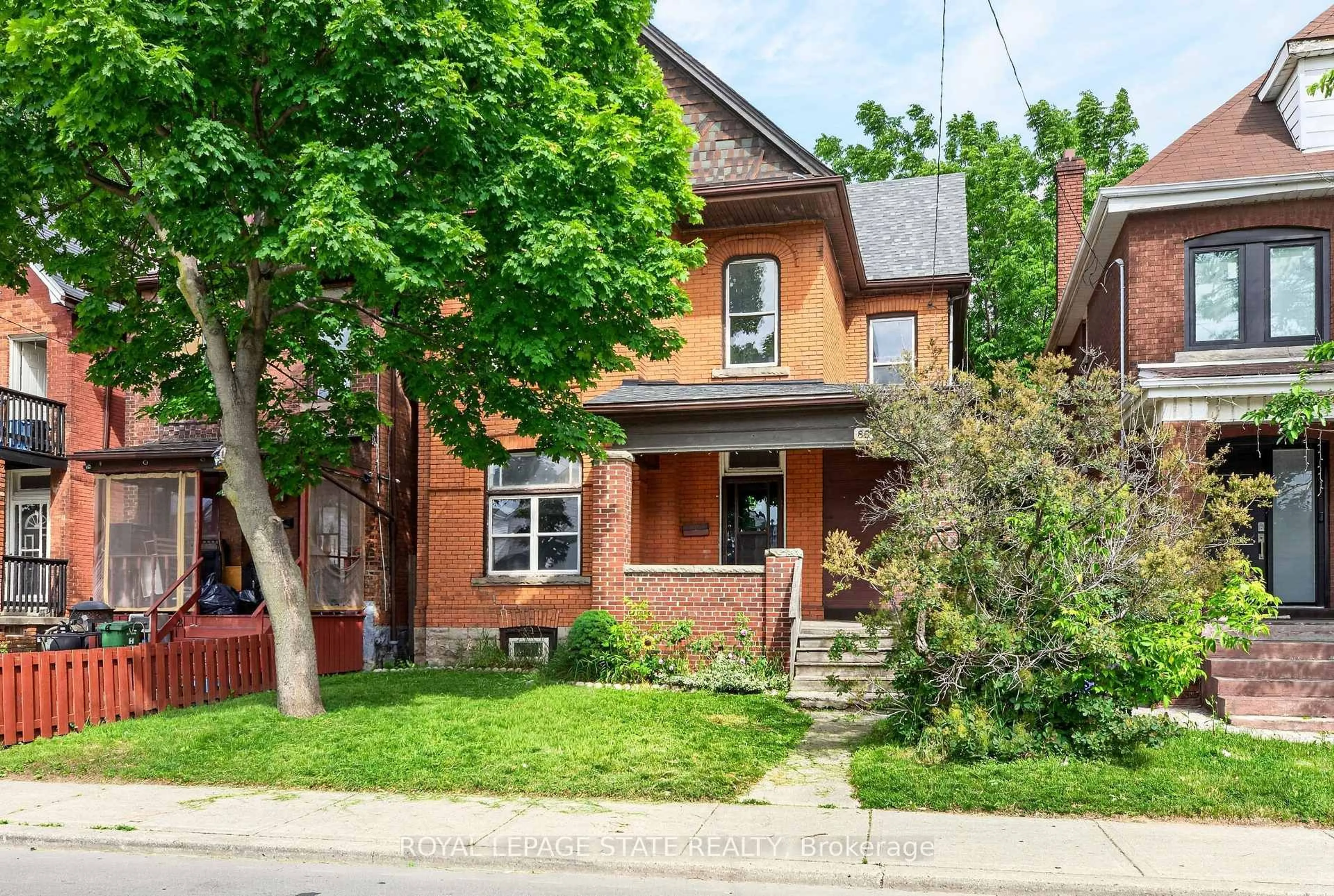 Home with brick exterior material, street for 86 Sherman Ave, Hamilton Ontario L8L 6M4