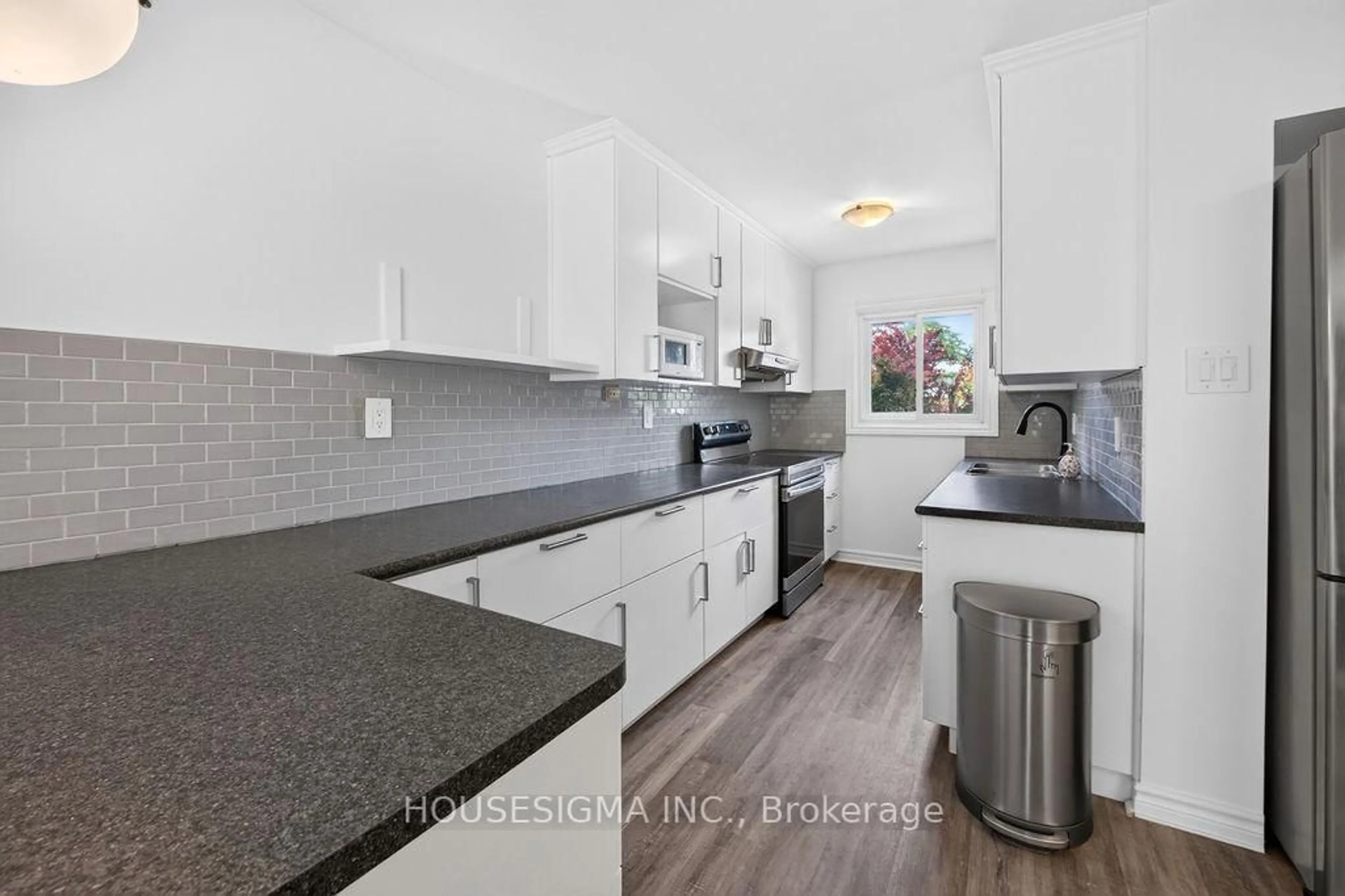Open concept kitchen, ceramic/tile floor for 166 Southdale Rd #143, London South Ontario N6J 2J1