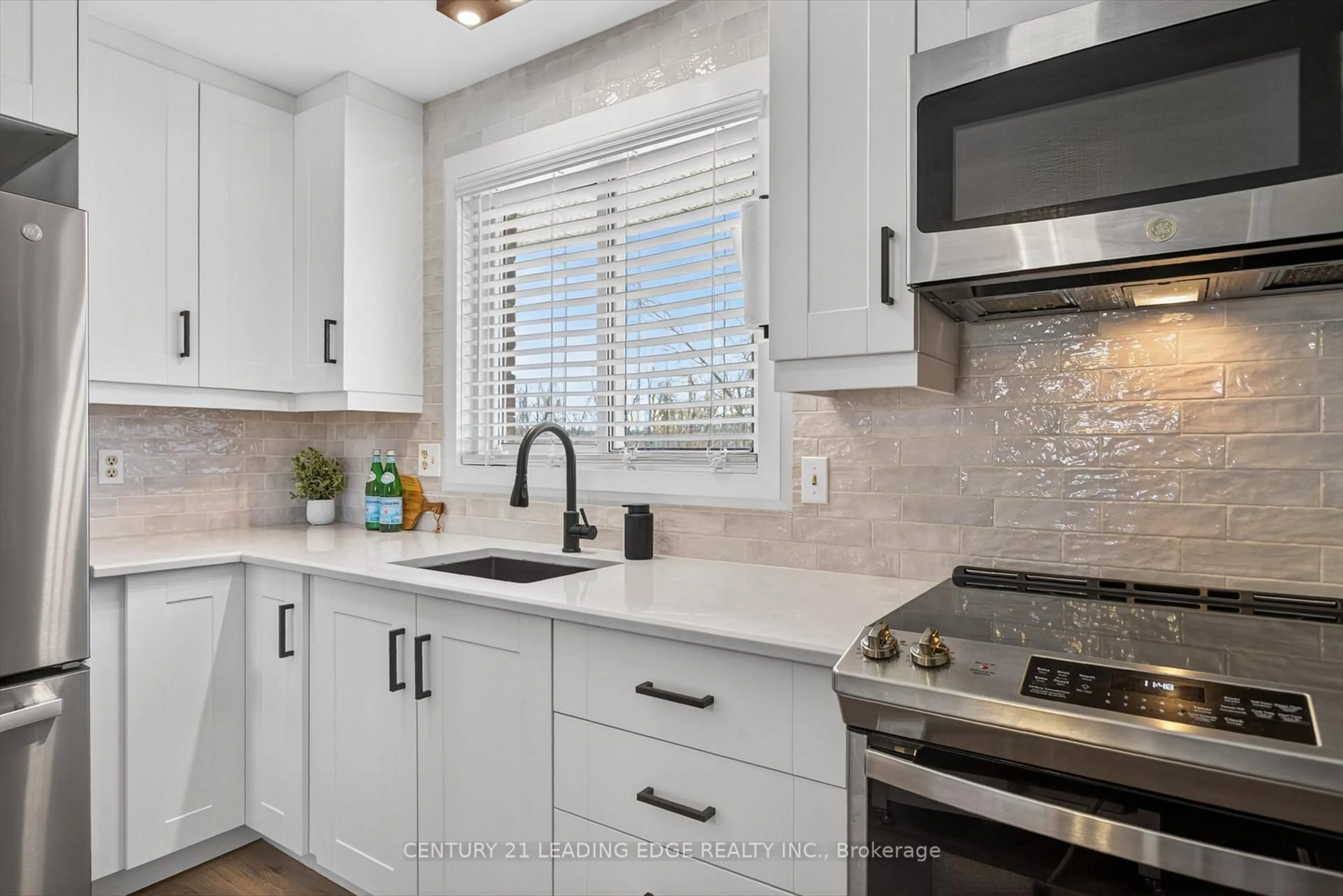 Open concept kitchen, ceramic/tile floor for 107 Rita Cres #A, Kawartha Lakes Ontario K0L 2W0