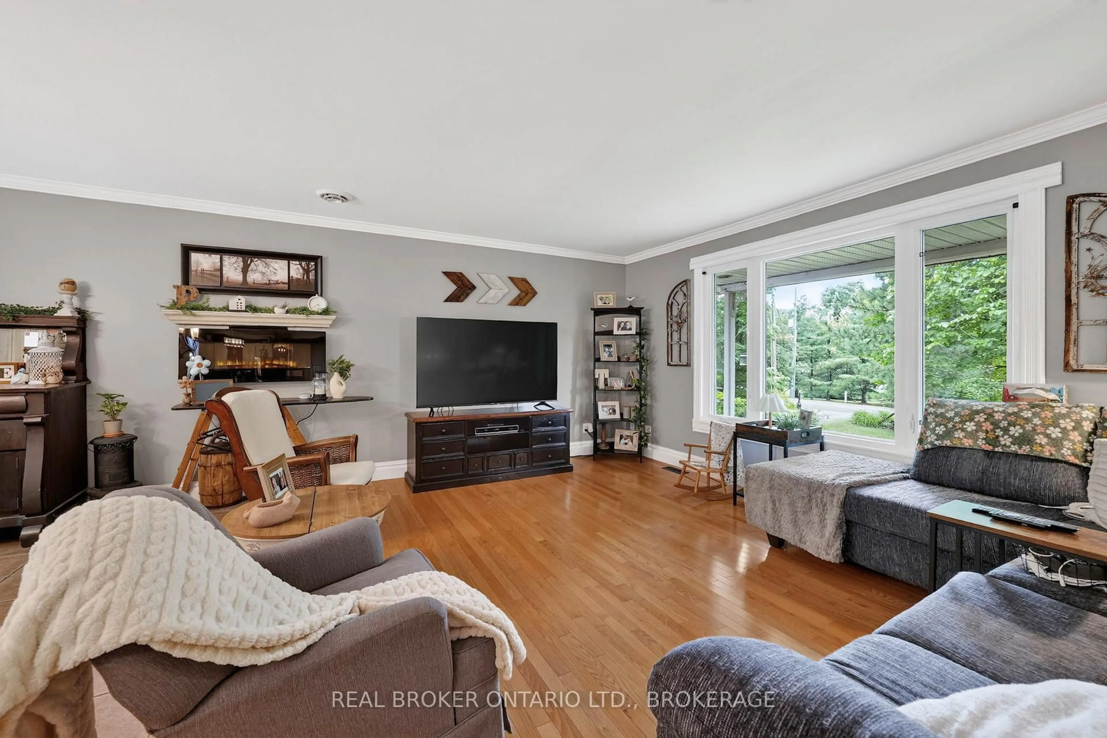 Living room with furniture, wood/laminate floor for 5121 Brunet Rd, South Stormont Ontario K0C 1R0
