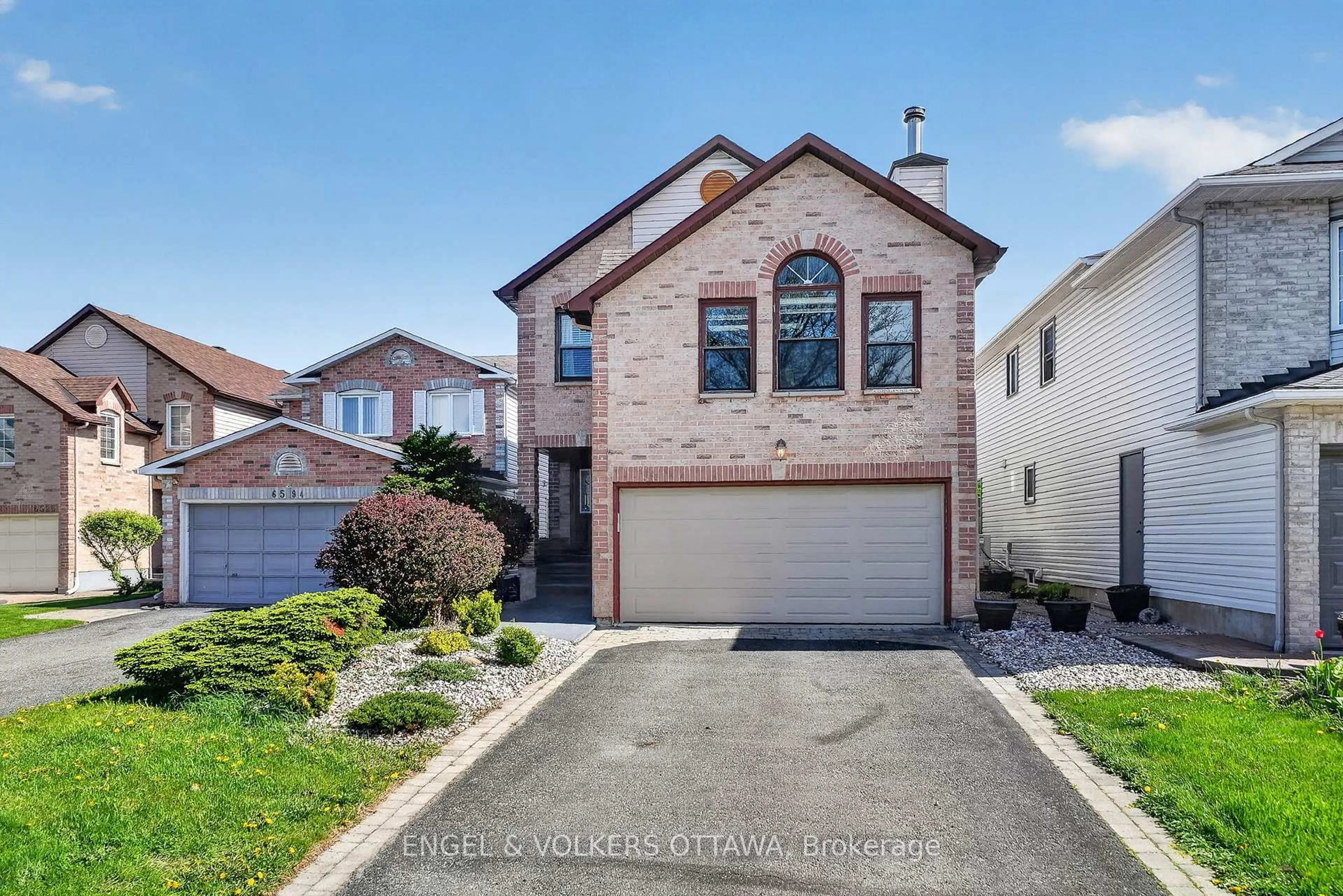 Home with brick exterior material, street for 6592 Windsong Ave, Orleans Ontario K1C 6M9