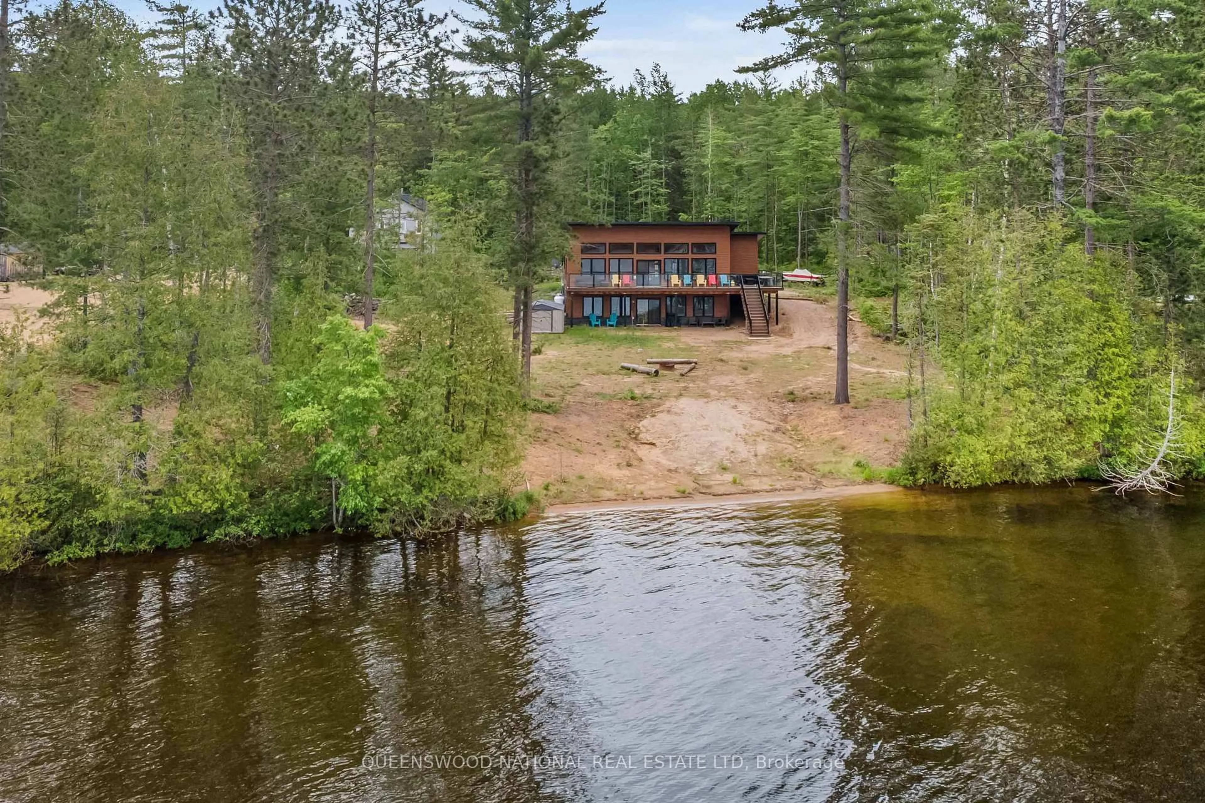 A pic from outside/outdoor area/front of a property/back of a property/a pic from drone, water/lake/river/ocean view for 227 Grunwald Rd, Barry's Bay Ontario K0J 1B0