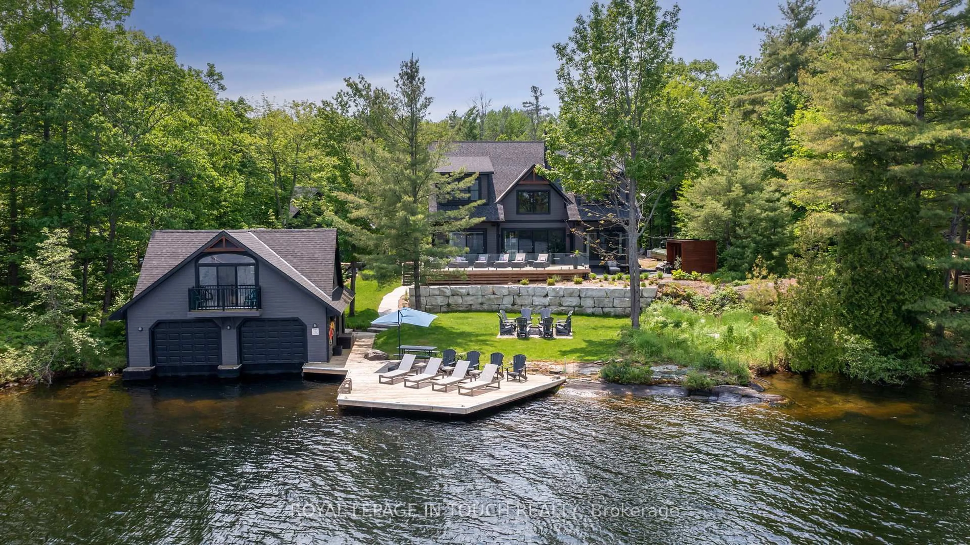 A pic from outside/outdoor area/front of a property/back of a property/a pic from drone, water/lake/river/ocean view for 93 Woodland Tr, Georgian Bay Ontario L0K 1S0