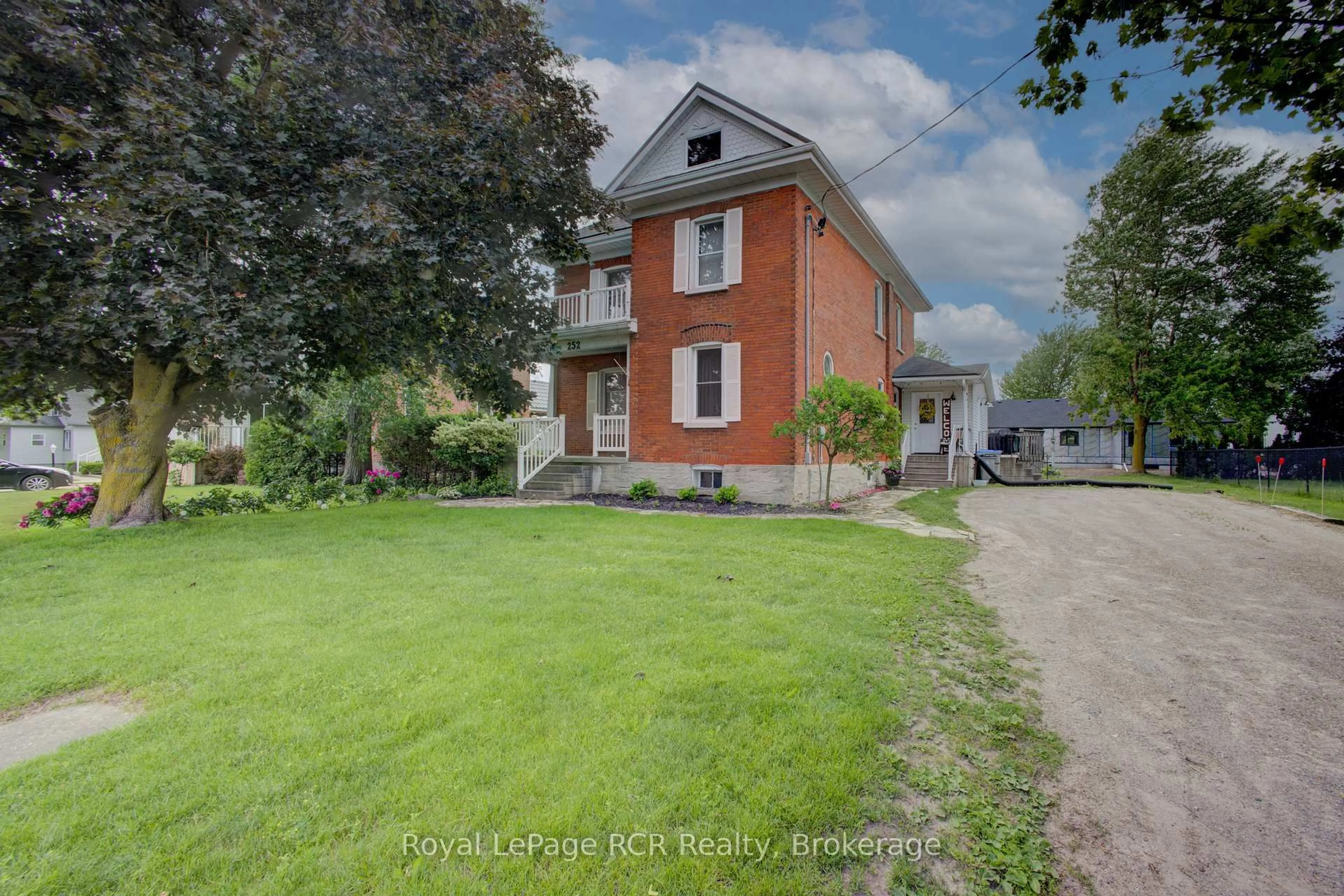 A pic from outside/outdoor area/front of a property/back of a property/a pic from drone, street for 252 Main St, North Perth Ontario N0G 1B0