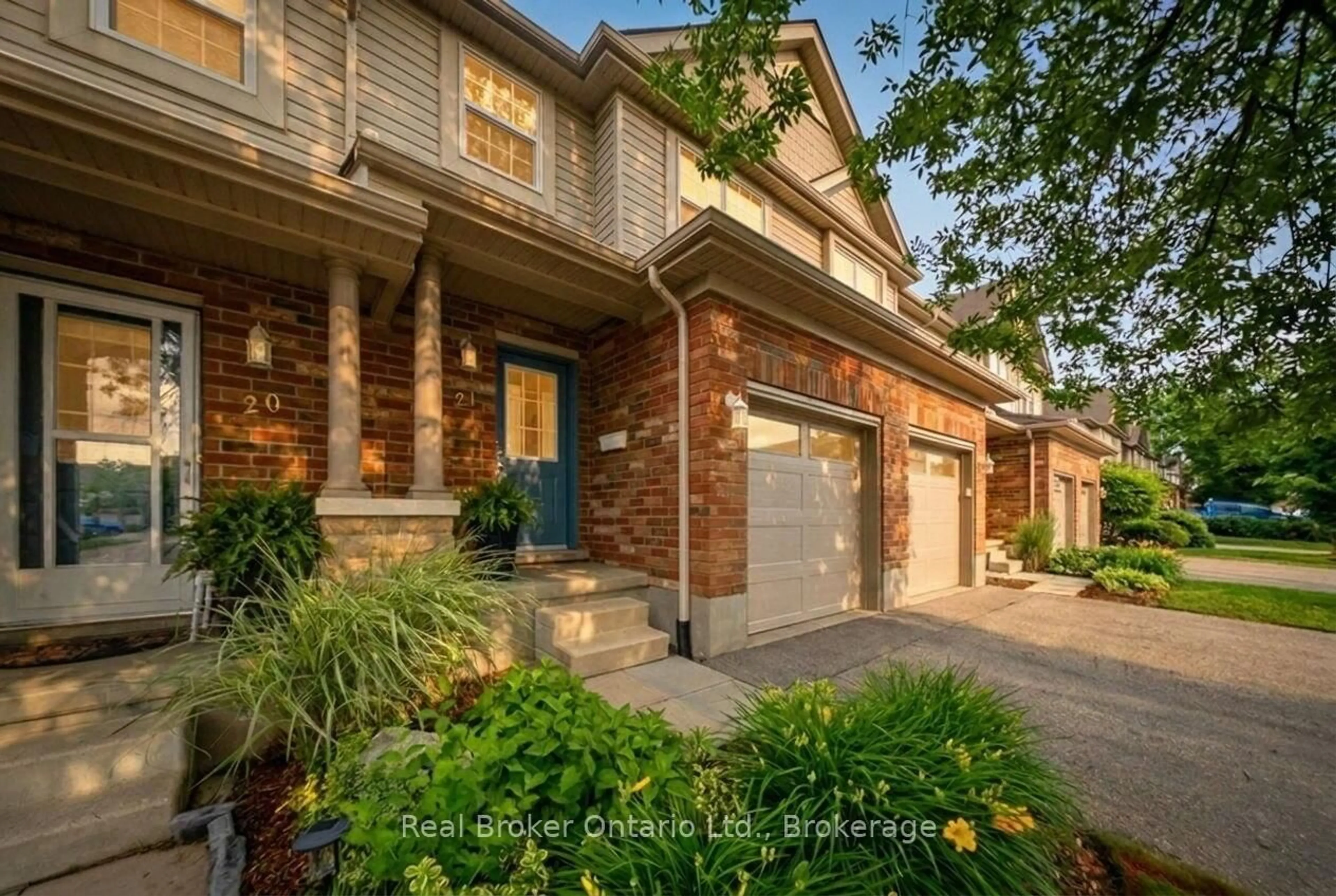 Home with brick exterior material, street for 30 Imperial Rd #21, Guelph Ontario N1K 1Y1