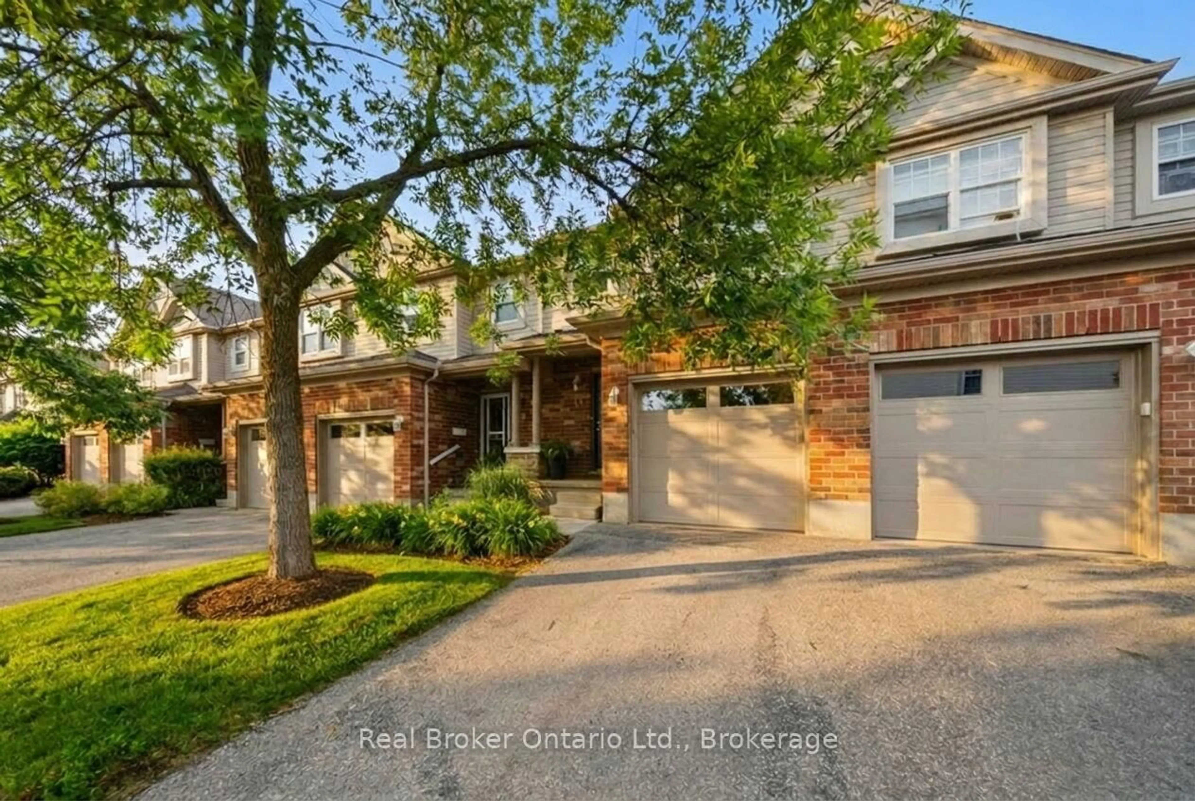 Home with brick exterior material, street for 30 Imperial Rd #21, Guelph Ontario N1K 1Y1