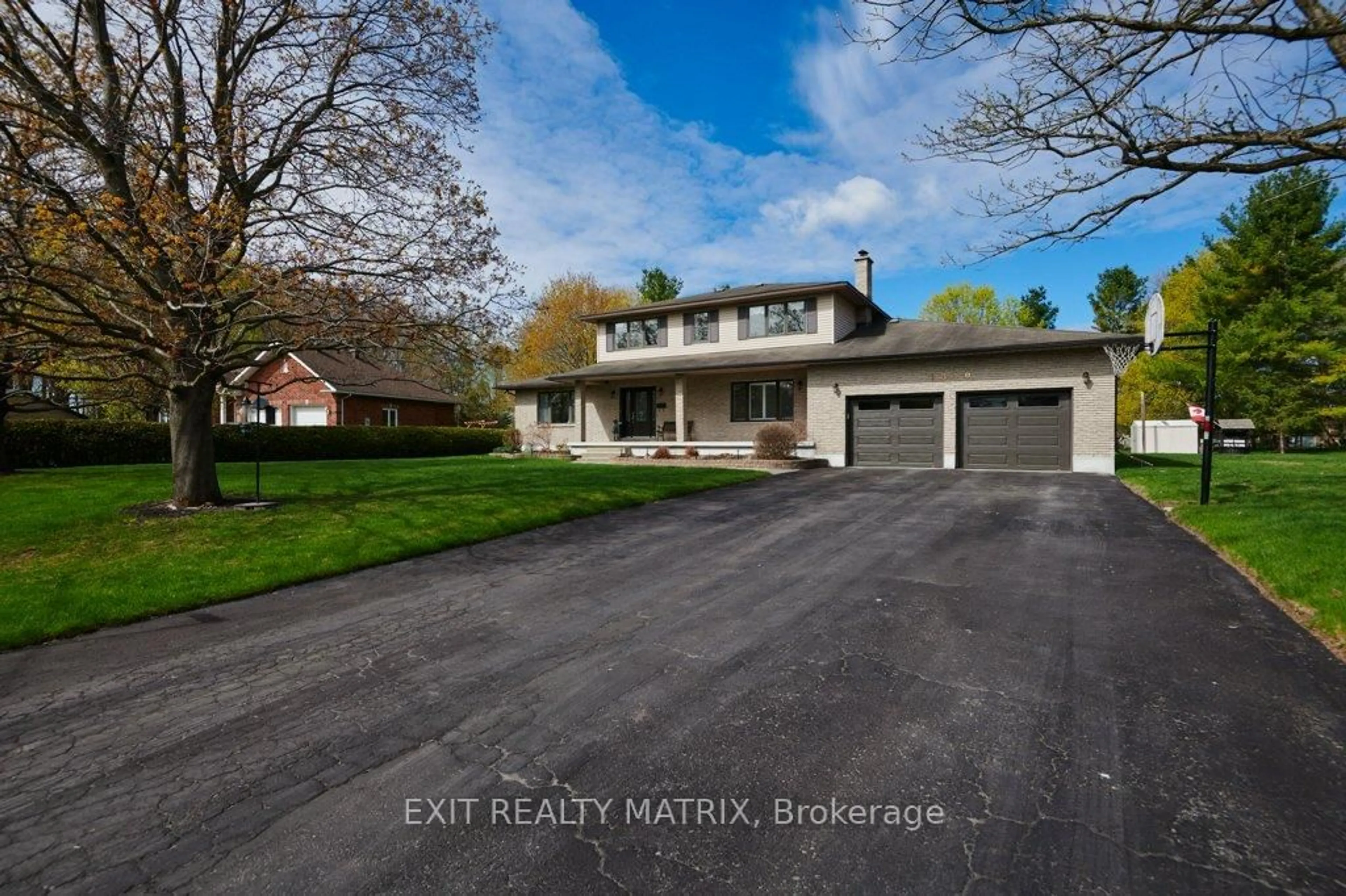 A pic from outside/outdoor area/front of a property/back of a property/a pic from drone, street for 1340 Cuthbert Way, Greely Ontario K4P 1A4