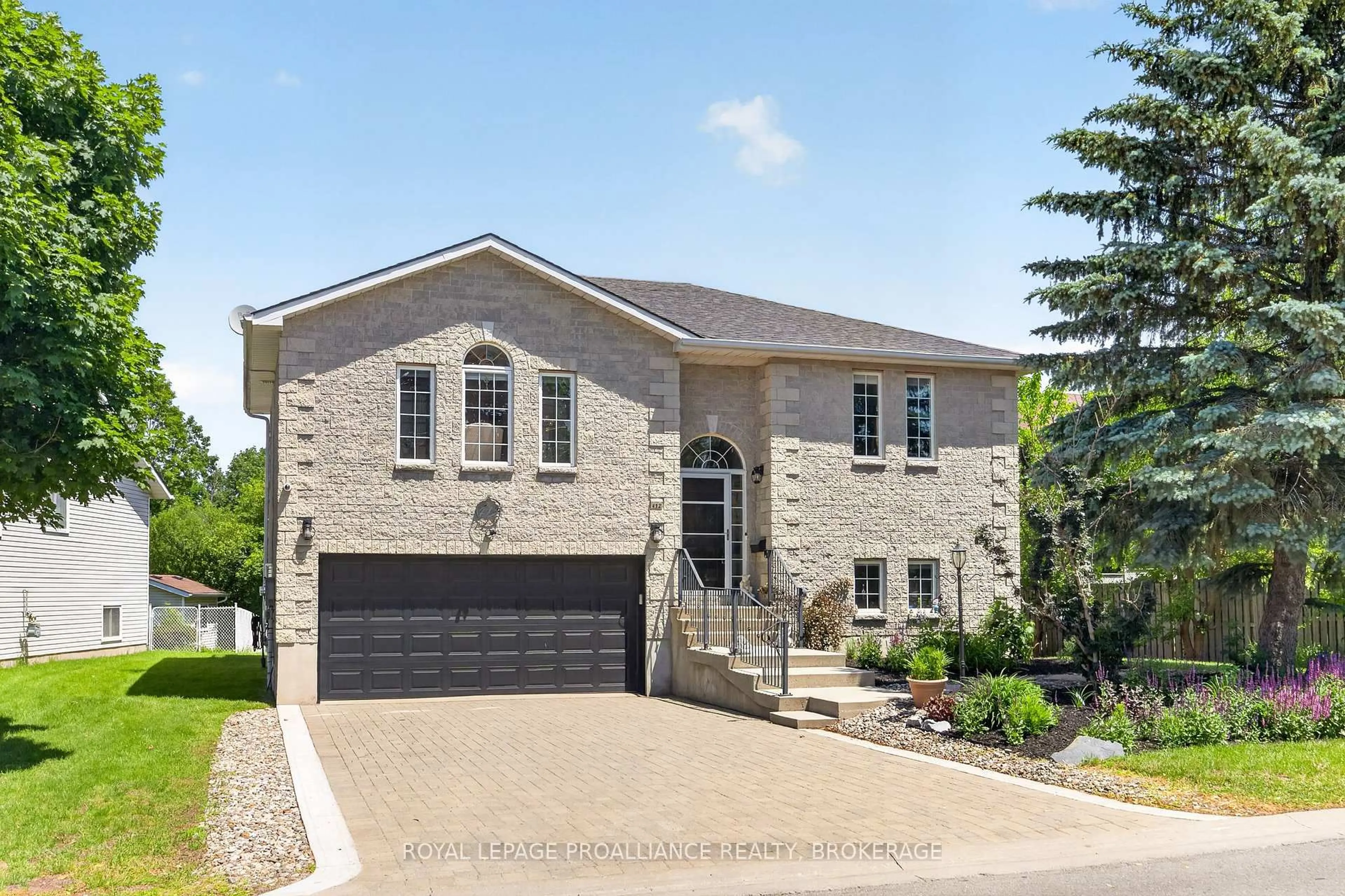 Home with brick exterior material, street for 412 Malabar Dr, Kingston Ontario K7M 8Z5