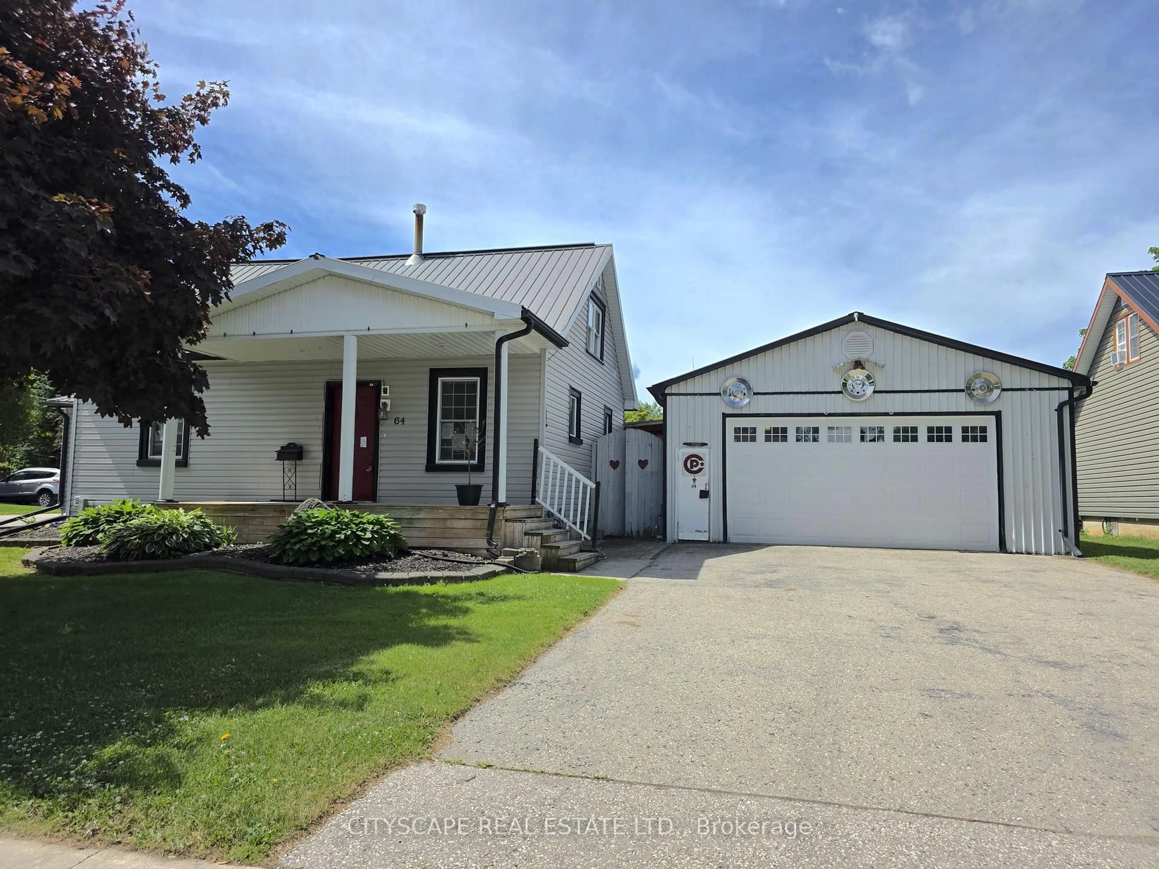 Home with vinyl exterior material, street for 64 George St, Minto Ontario N0G 1Z0