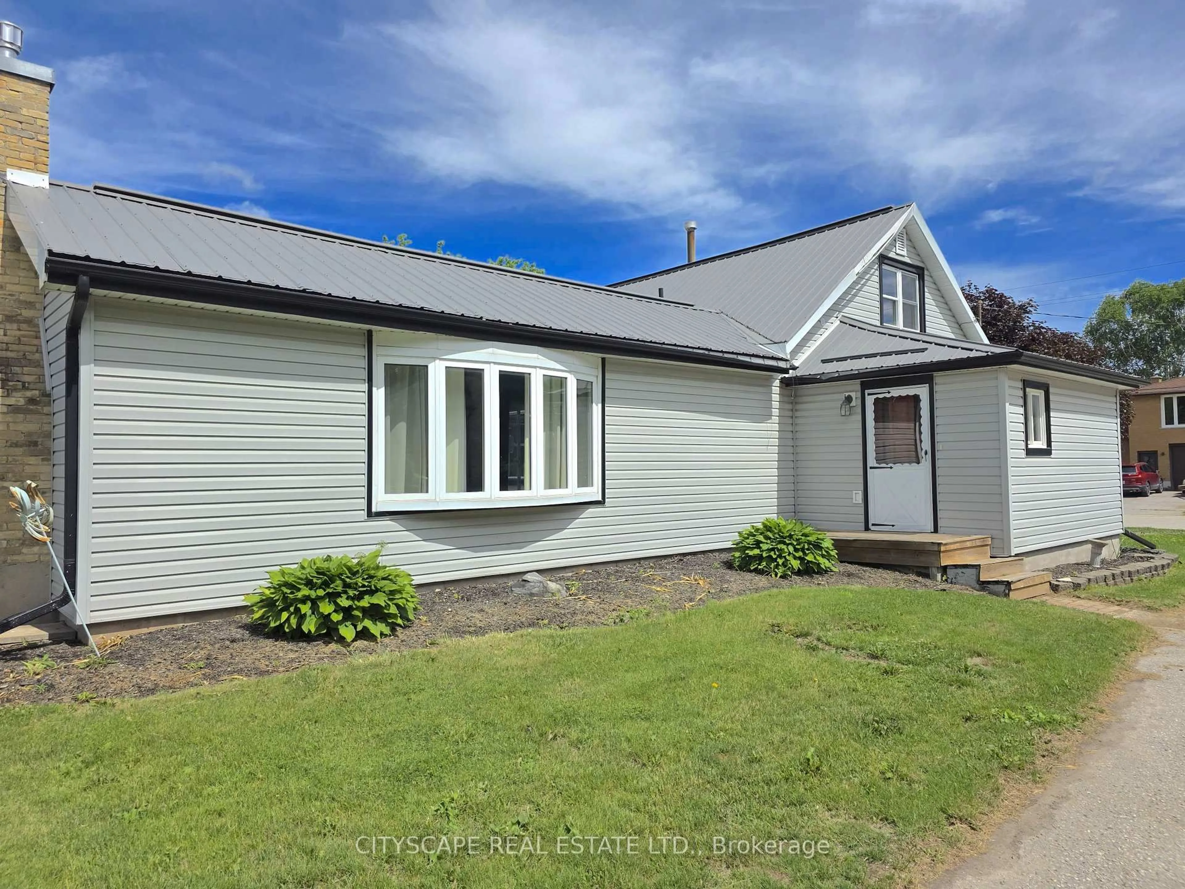 A pic from outside/outdoor area/front of a property/back of a property/a pic from drone, building for 64 George St, Minto Ontario N0G 1Z0