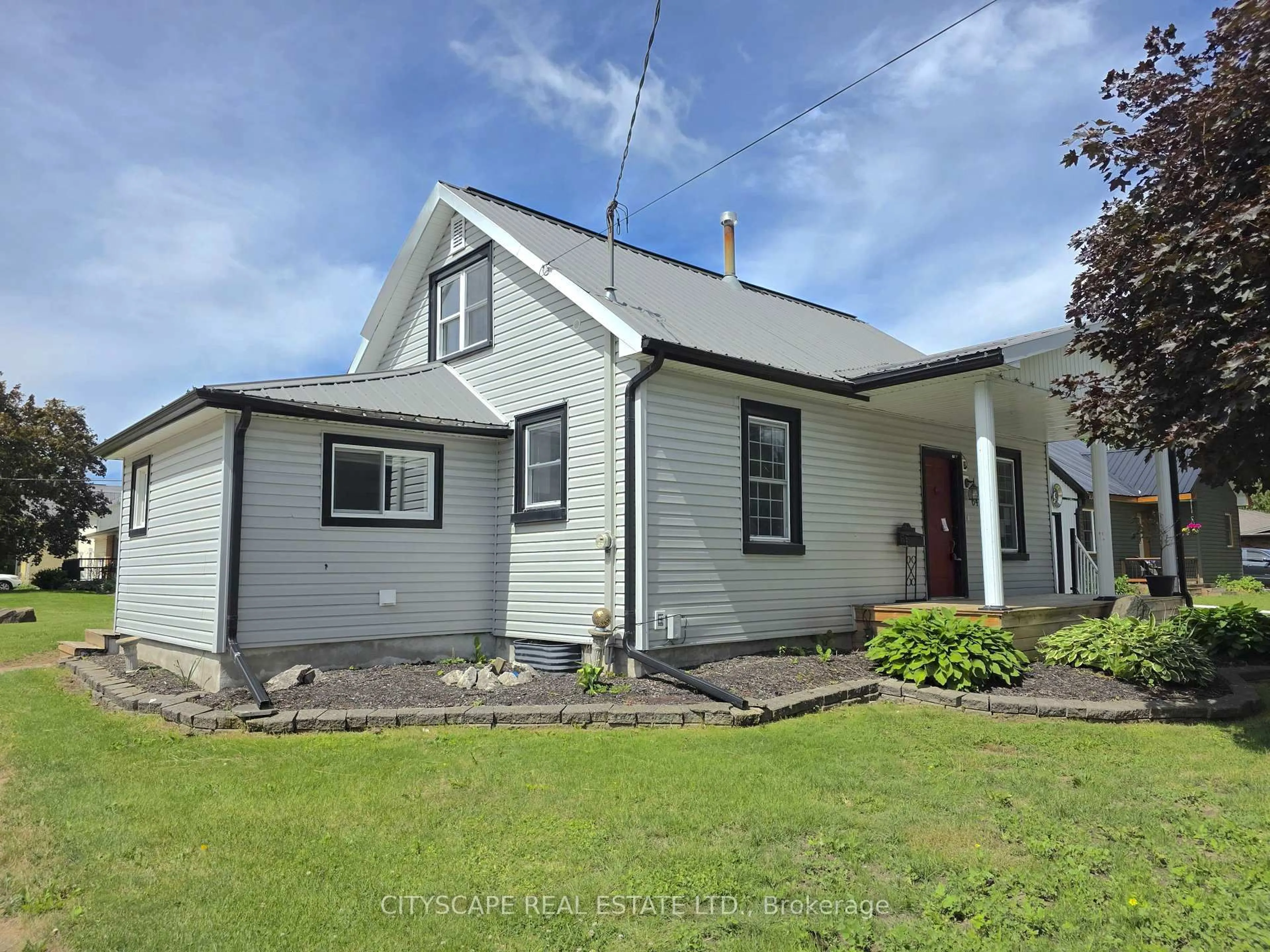 A pic from outside/outdoor area/front of a property/back of a property/a pic from drone, building for 64 George St, Minto Ontario N0G 1Z0