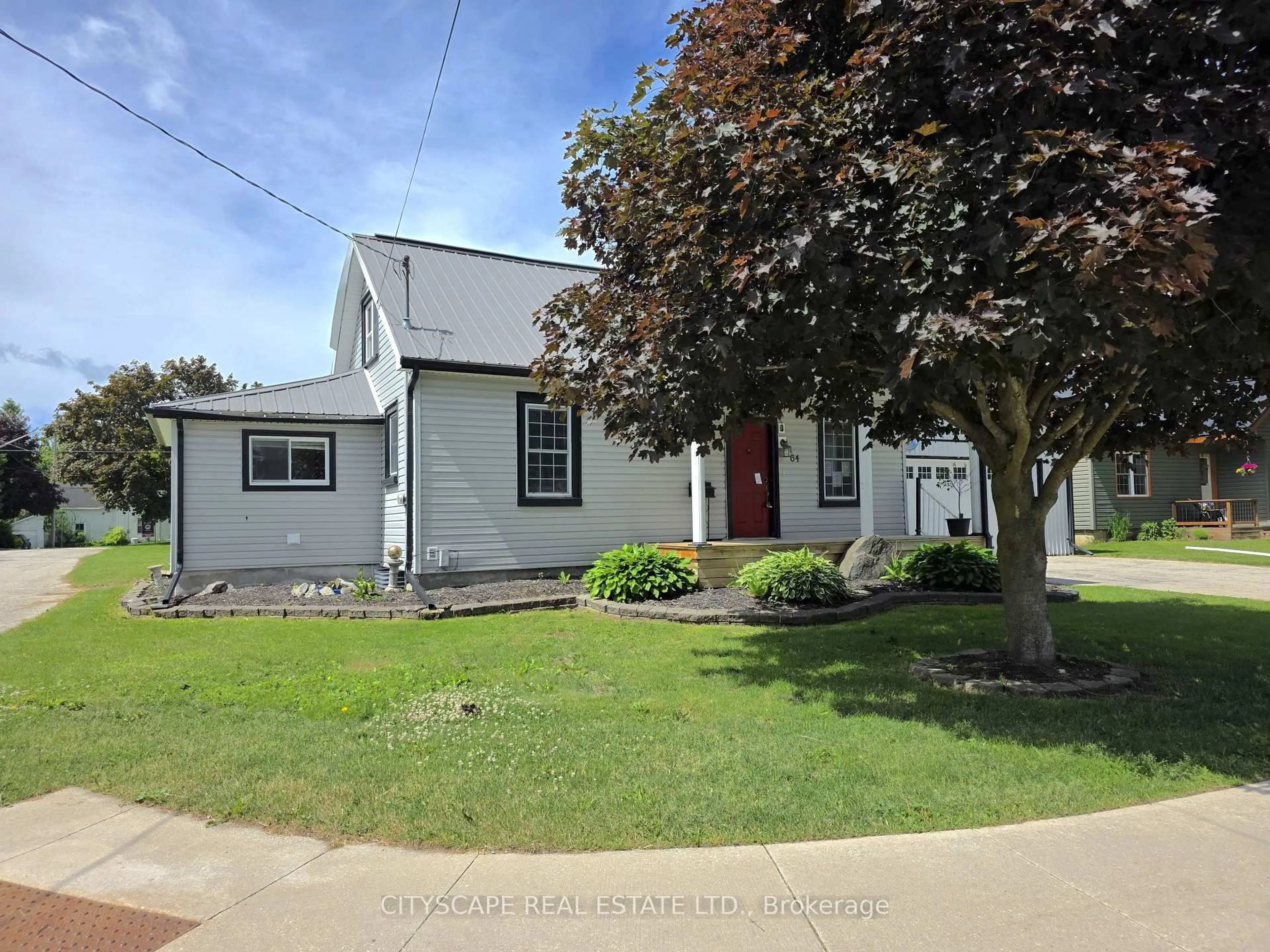A pic from outside/outdoor area/front of a property/back of a property/a pic from drone, street for 64 George St, Minto Ontario N0G 1Z0