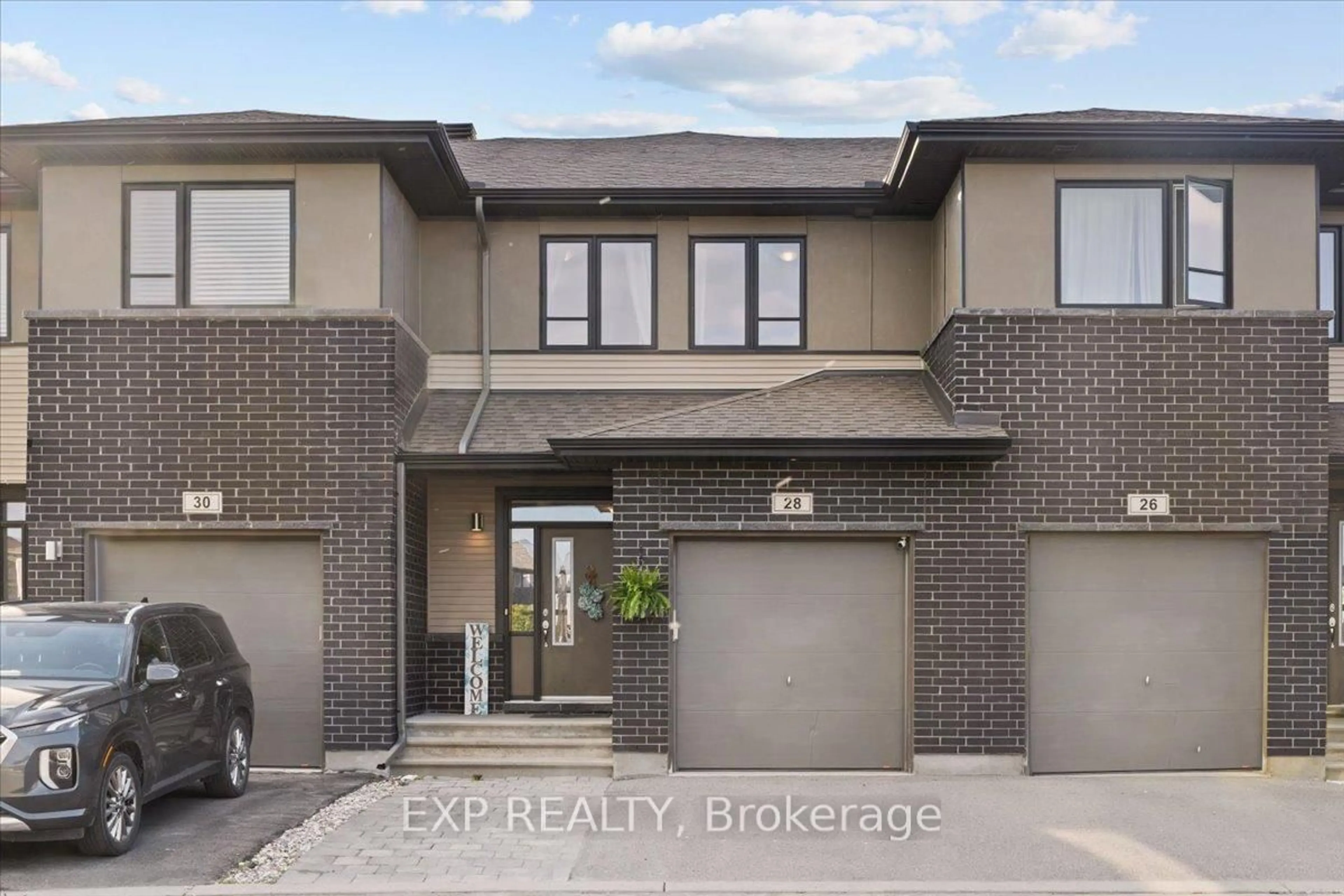 Home with brick exterior material, street for 28 Hackney Private, Stittsville Ontario K2V 0K8