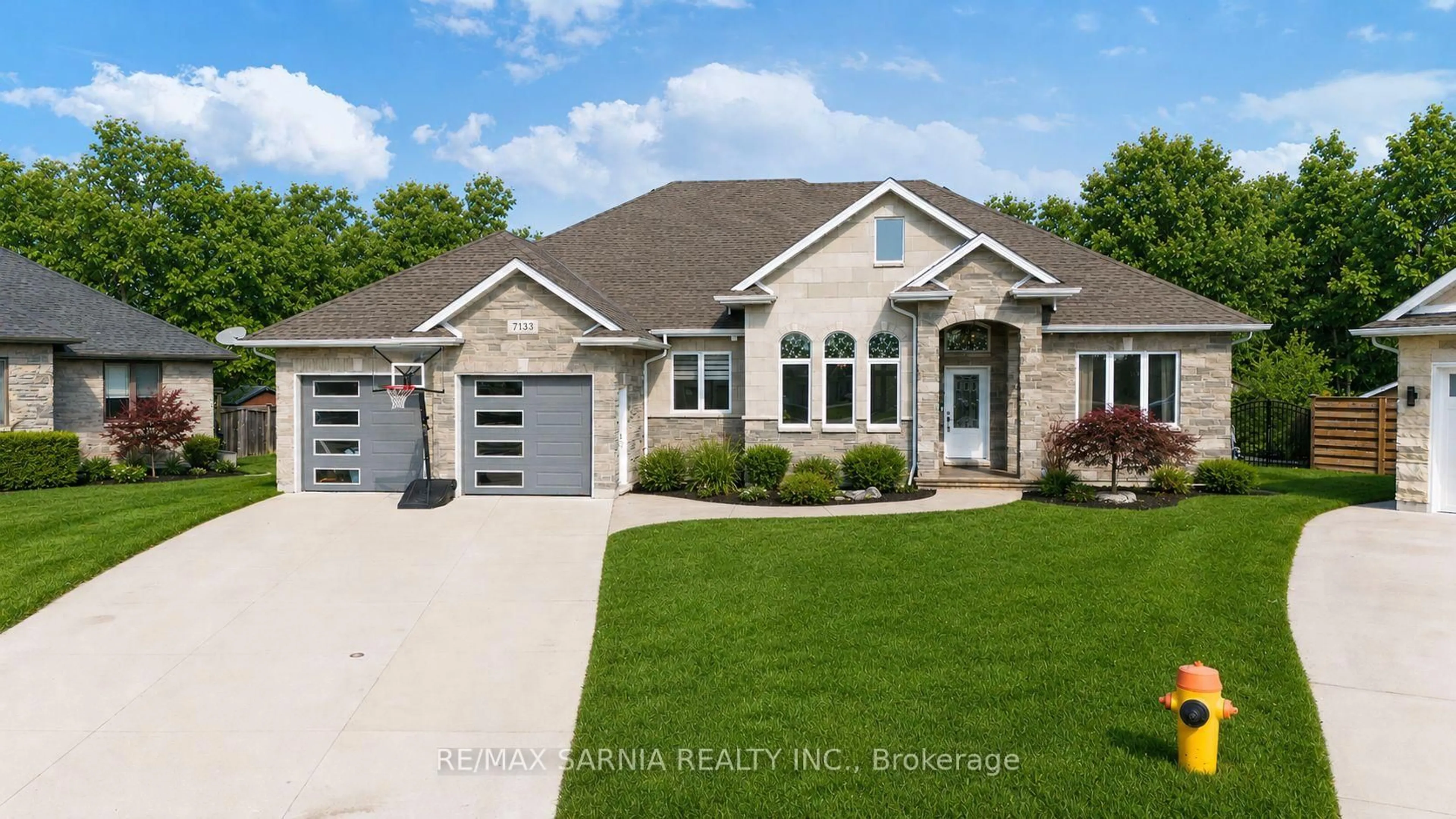 Home with vinyl exterior material, street for 7133 Muskoka Tr, Plympton-Wyoming Ontario N0N 1E0
