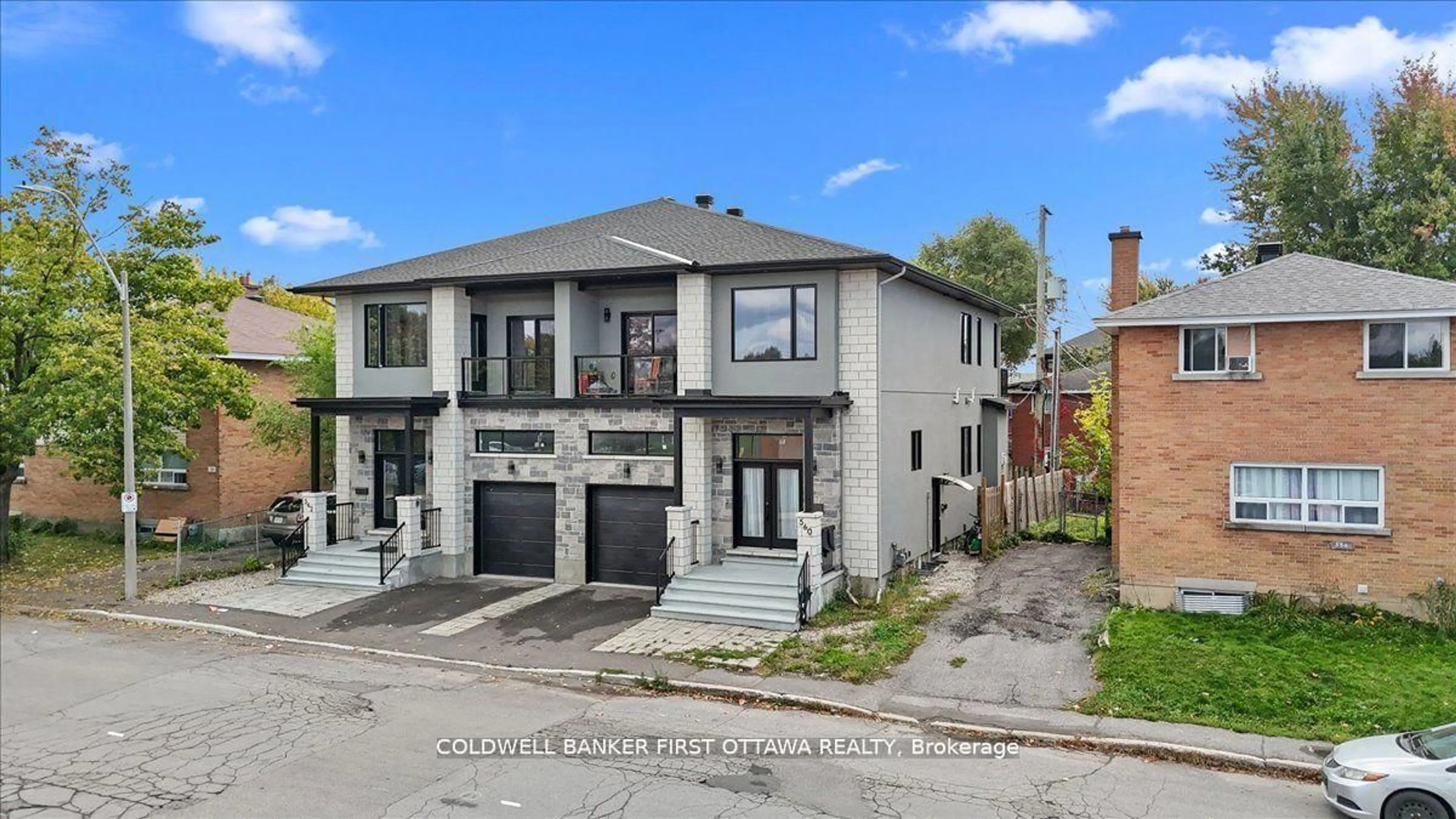 Home with brick exterior material, street for 560 QUEEN MARY St, Ottawa Ontario K1K 1W1