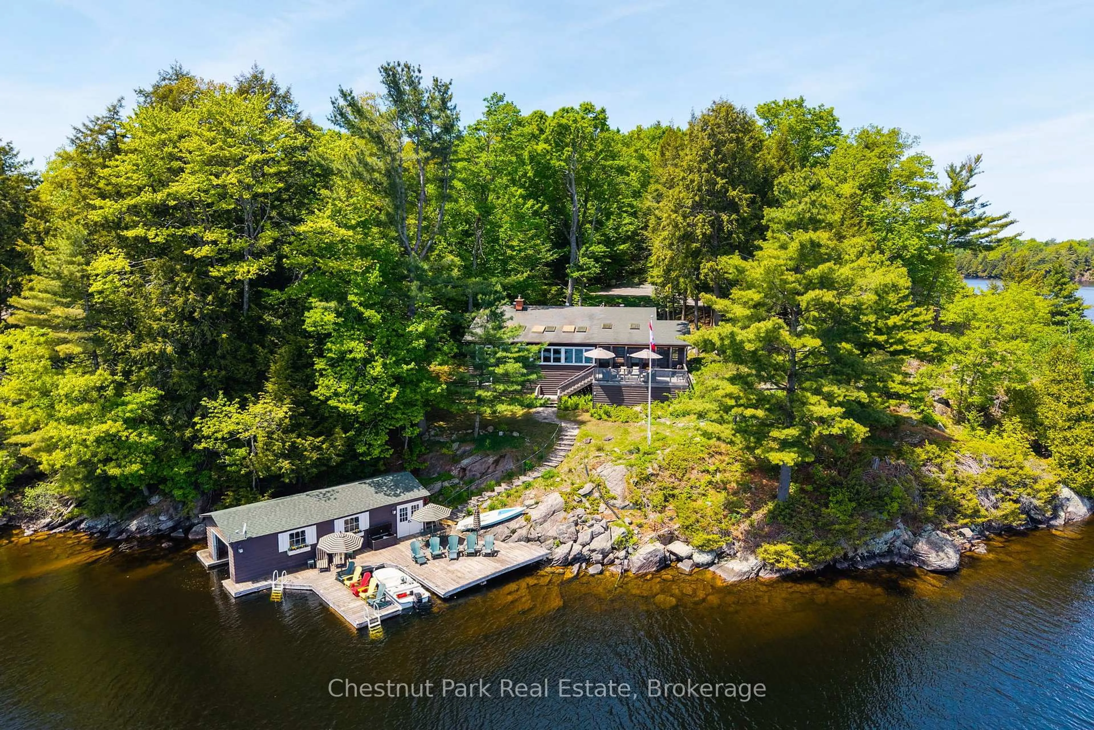 A pic from outside/outdoor area/front of a property/back of a property/a pic from drone, water/lake/river/ocean view for 1160 Whiteside Rd #51A, Muskoka Lakes Ontario P0B 1J0