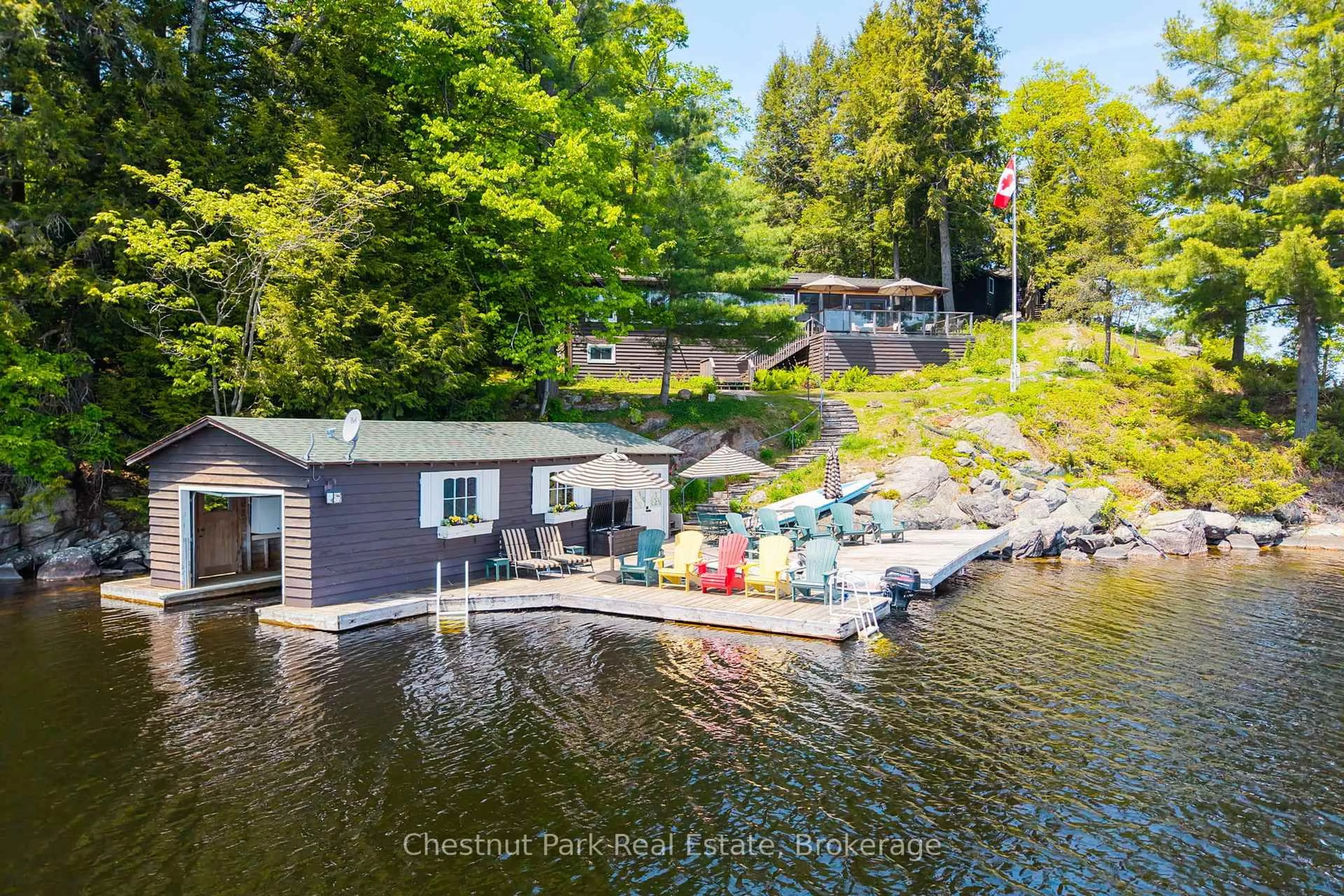 A pic from outside/outdoor area/front of a property/back of a property/a pic from drone, water/lake/river/ocean view for 1160 Whiteside Rd #51A, Muskoka Lakes Ontario P0B 1J0