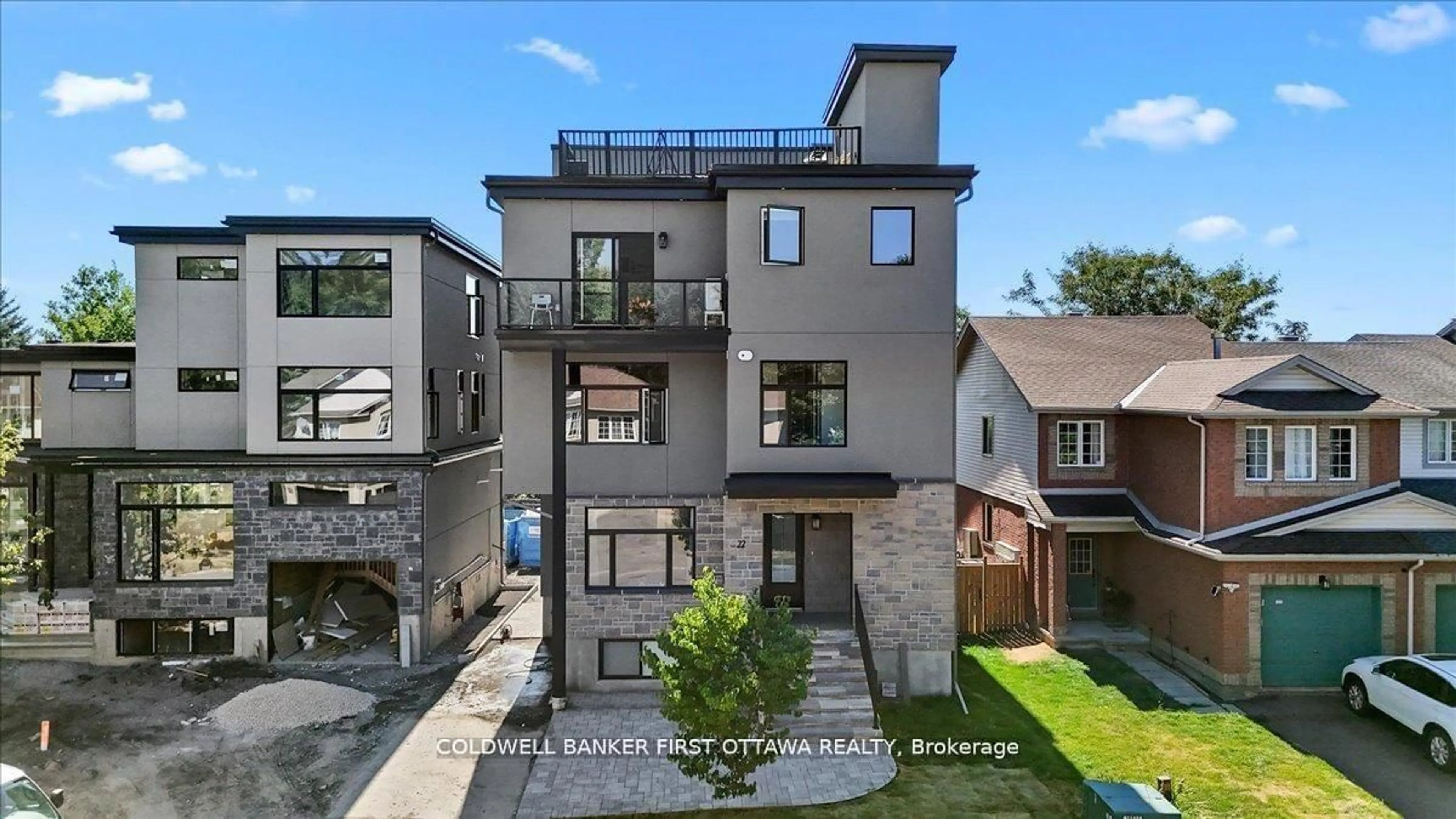 Home with brick exterior material, street for 25 Pennard Way #A & B, Ottawa Ontario K1T 4C1