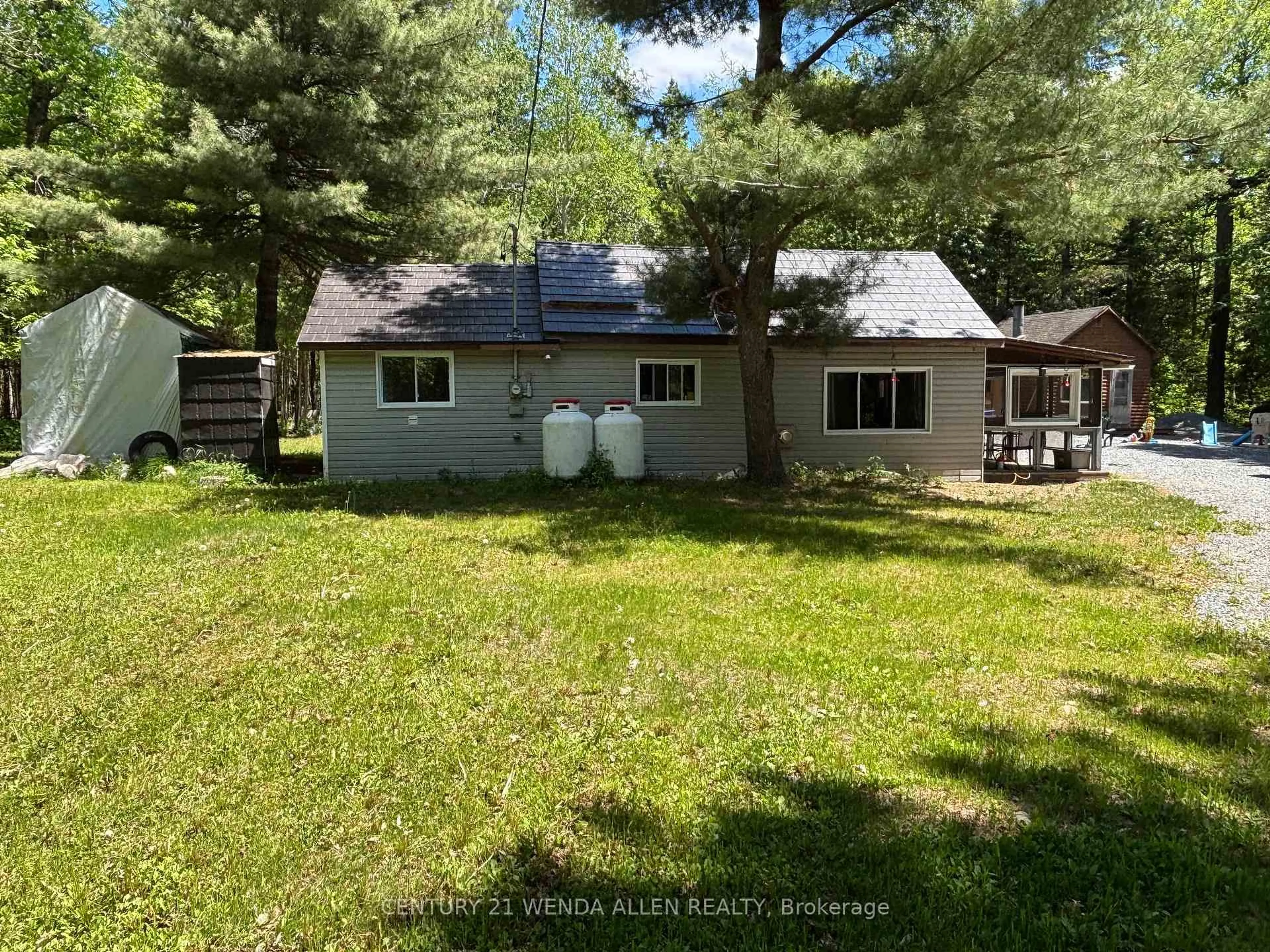 A pic from outside/outdoor area/front of a property/back of a property/a pic from drone, unknown for 2913 Highway 11 Highway, Temagami Ontario P0M 1T0