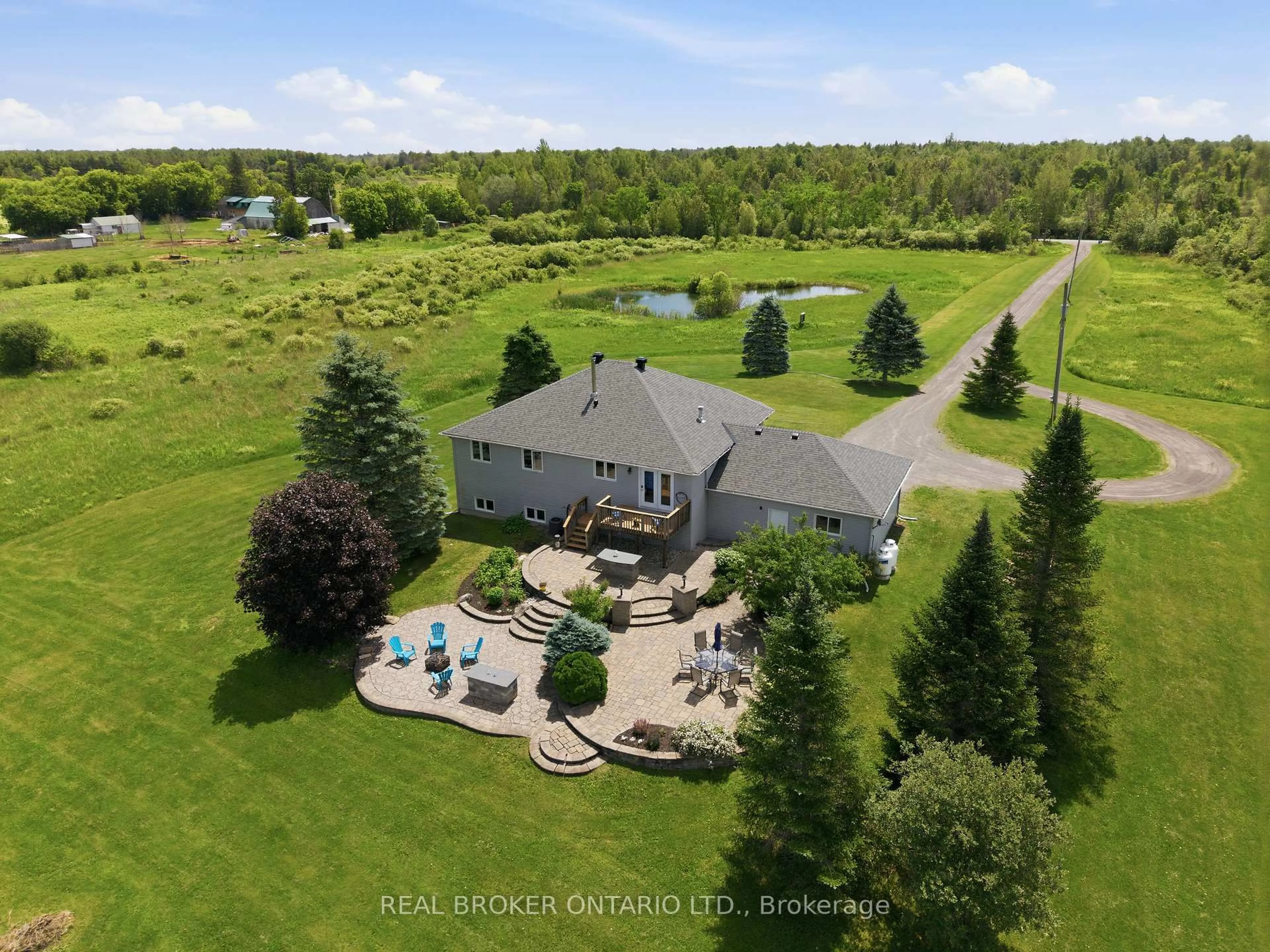 A pic from outside/outdoor area/front of a property/back of a property/a pic from drone, water/lake/river/ocean view for 1659 Lindsay Rd, North Grenville Ontario K0G 1S0