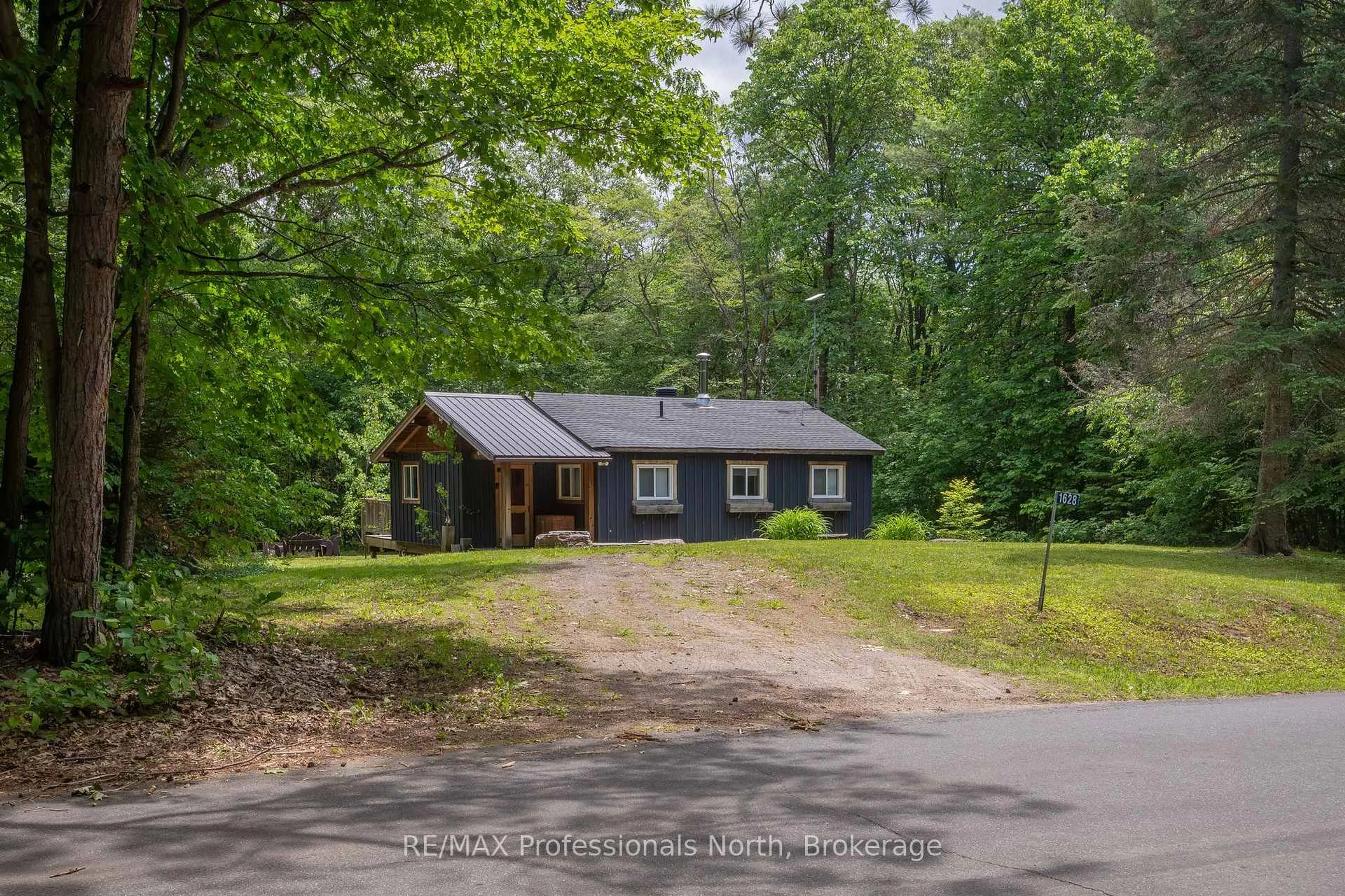 A pic from outside/outdoor area/front of a property/back of a property/a pic from drone, street for 1628 Boshkung Lake Rd, Algonquin Highlands Ontario K0M 1J1
