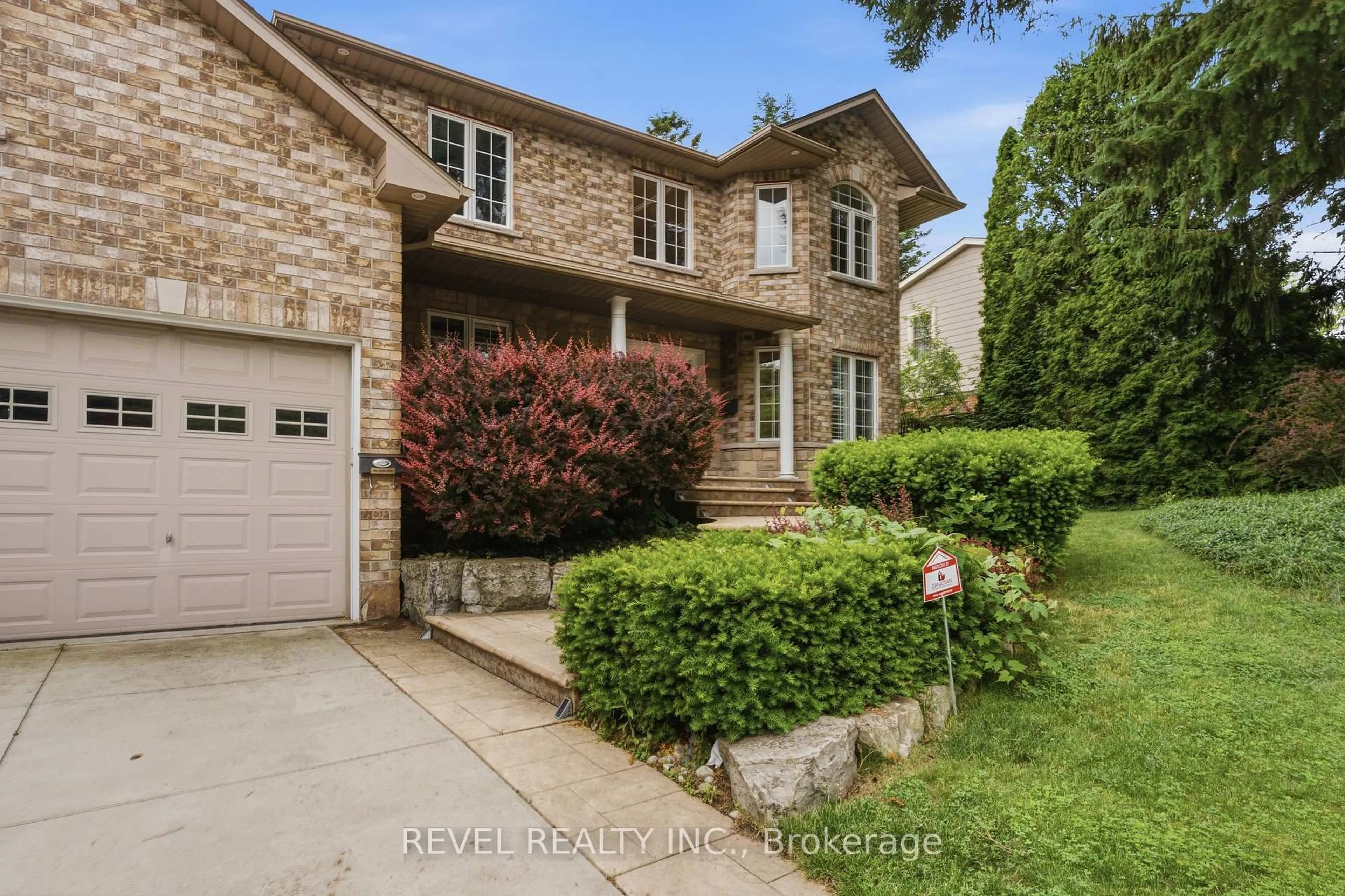 Home with brick exterior material, street for 11 Maynard St, Hamilton Ontario L9B 1A9