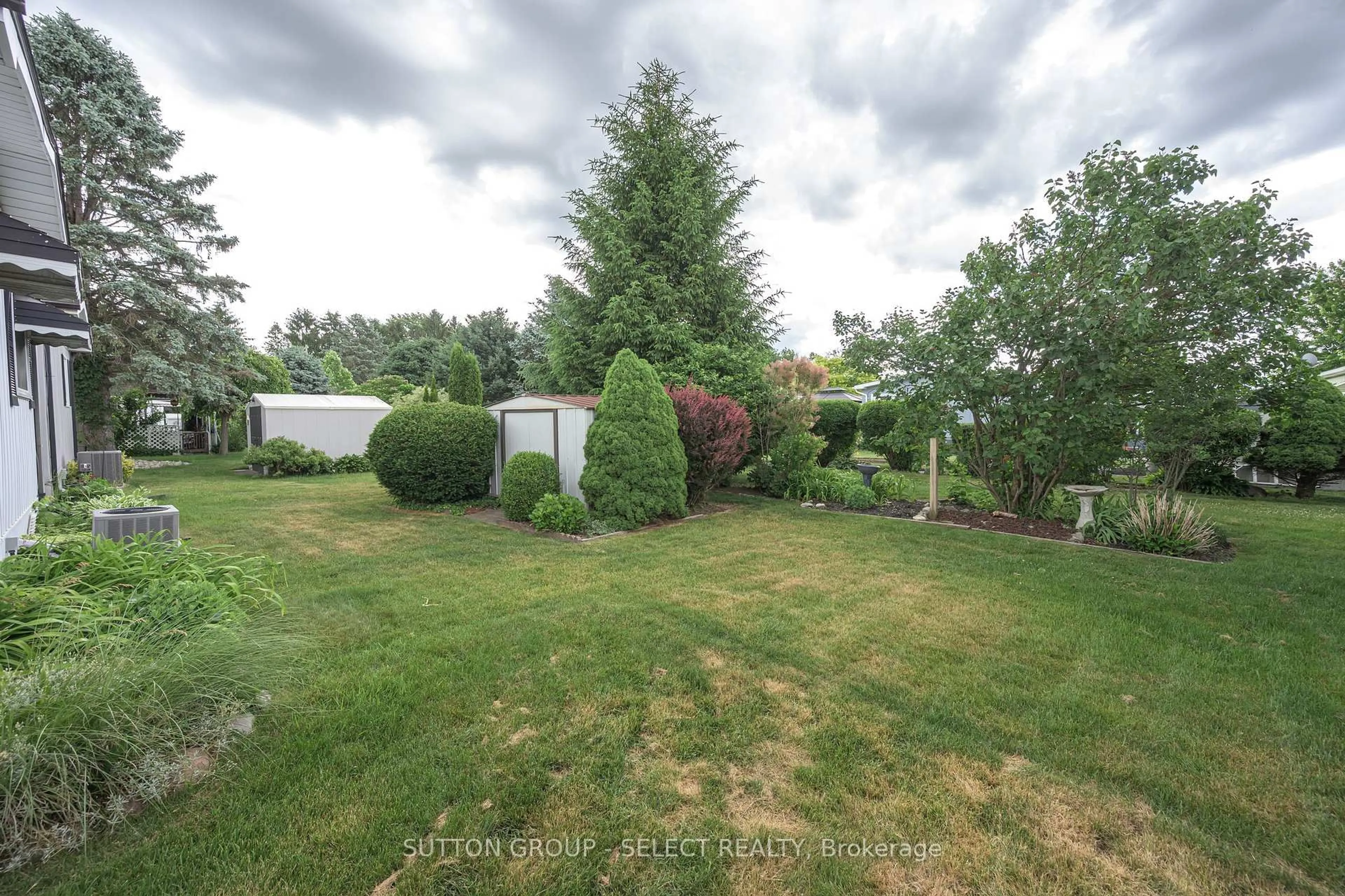 A pic from outside/outdoor area/front of a property/back of a property/a pic from drone, forest/trees view for 32 Miller St, Strathroy-Caradoc Ontario N7G 3K8