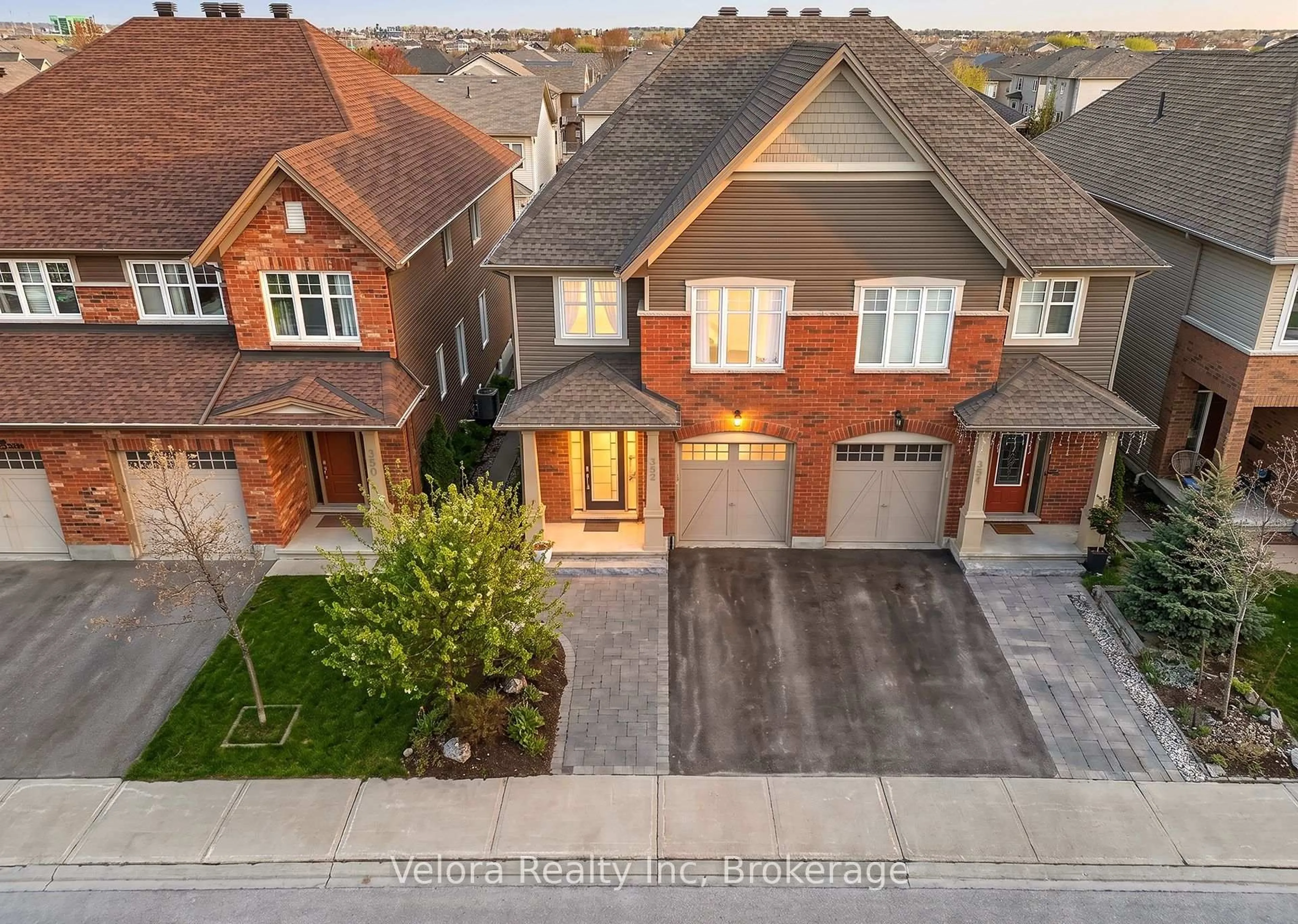 A pic from outside/outdoor area/front of a property/back of a property/a pic from drone, street for 352 Warmstone Dr, Ottawa Ontario K2S 0W3