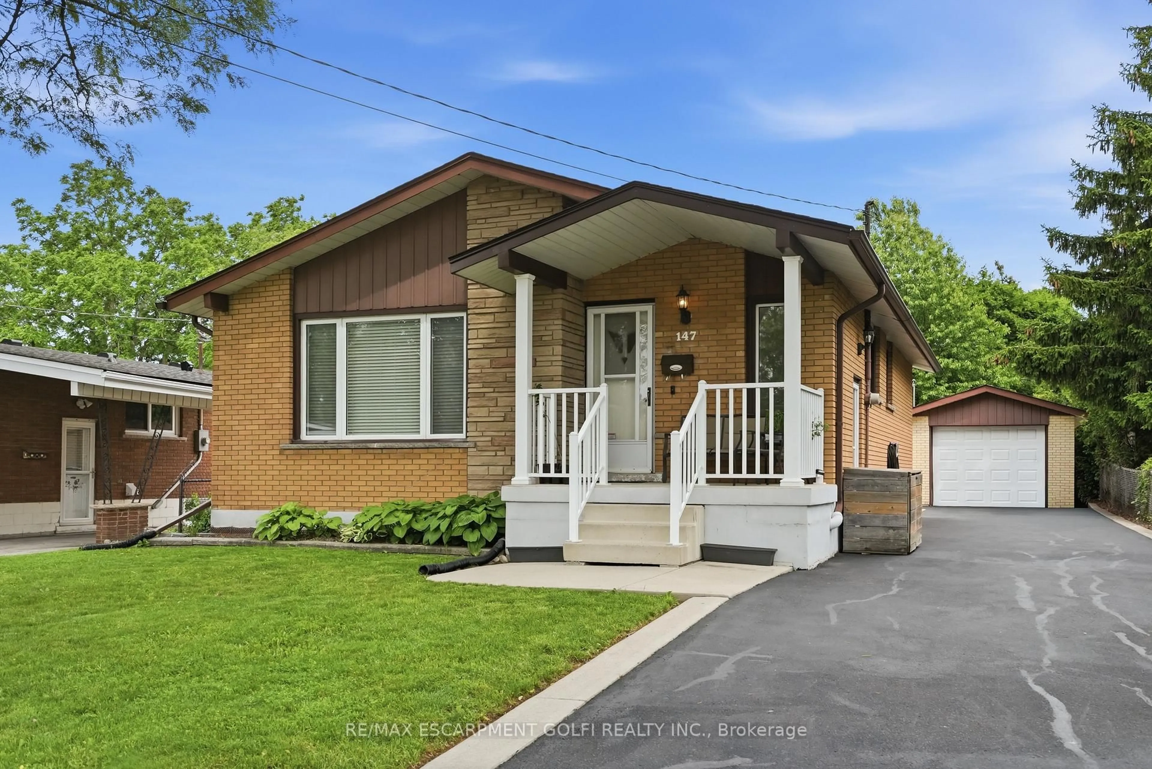 Home with brick exterior material, street for 147 Manning Ave, Hamilton Ontario L9A 3E8