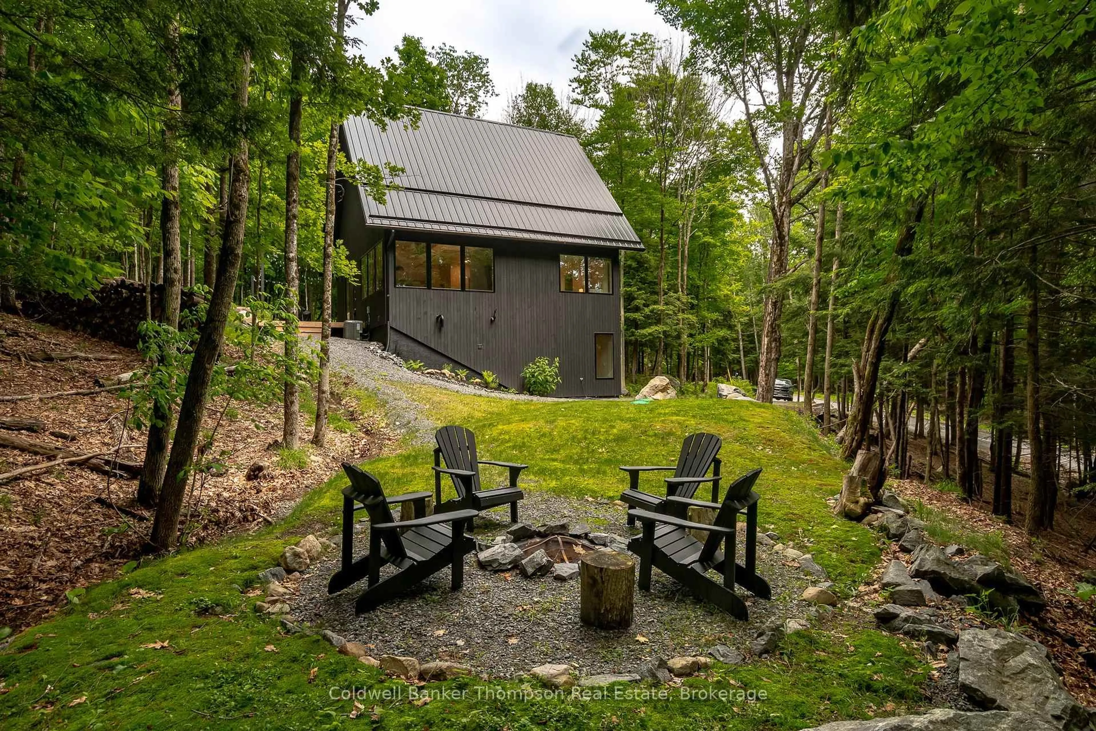 Patio, forest/trees view for 84 Vernon Lane, Huntsville Ontario P1H 2J2