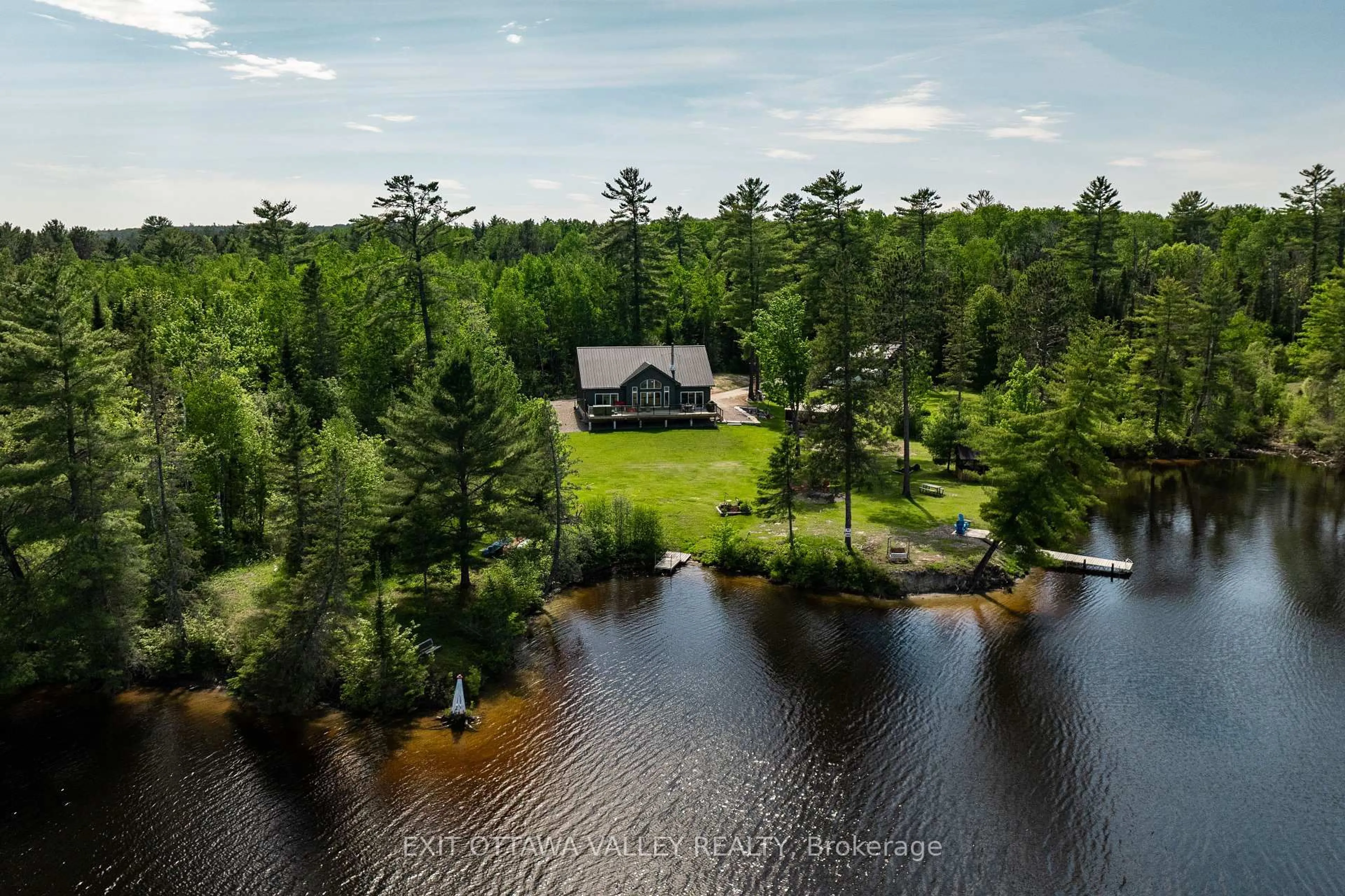 A pic from outside/outdoor area/front of a property/back of a property/a pic from drone, water/lake/river/ocean view for 82 Jennings Rd, Mackey Ontario K0J 2B0