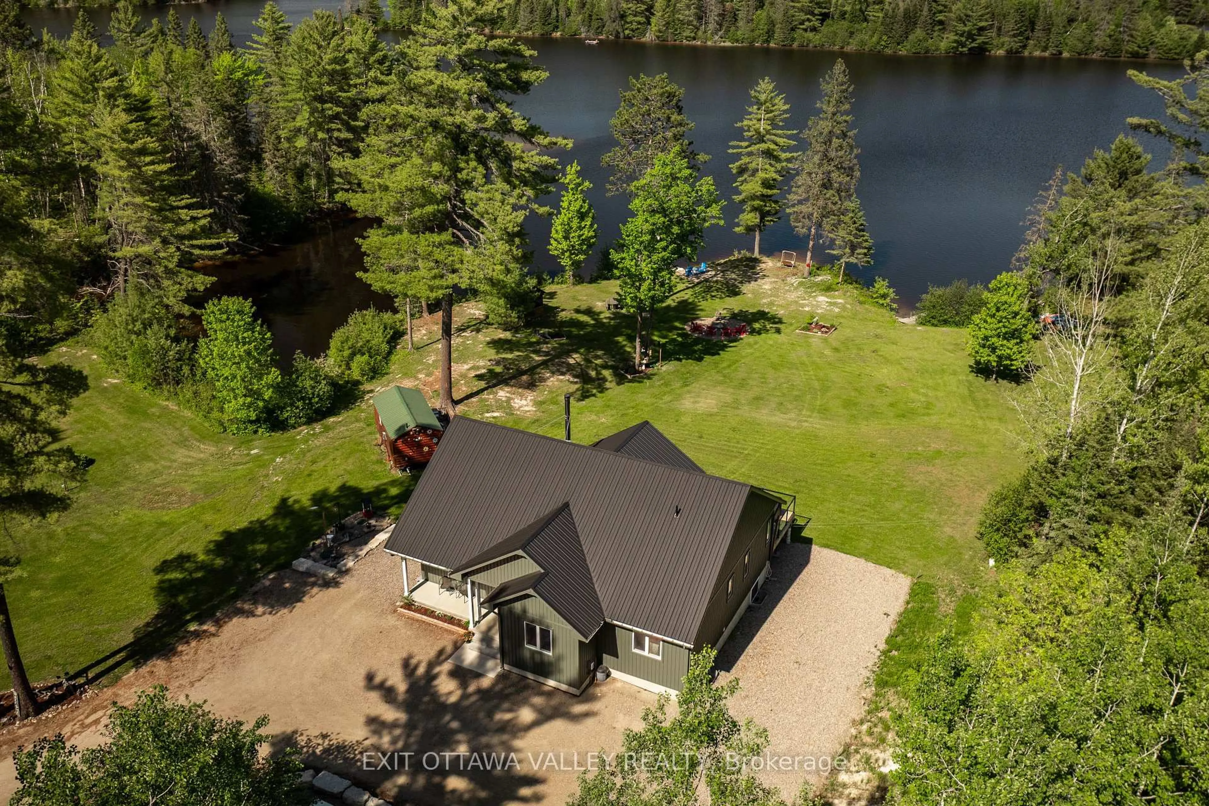 A pic from outside/outdoor area/front of a property/back of a property/a pic from drone, water/lake/river/ocean view for 82 Jennings Rd, Mackey Ontario K0J 2B0