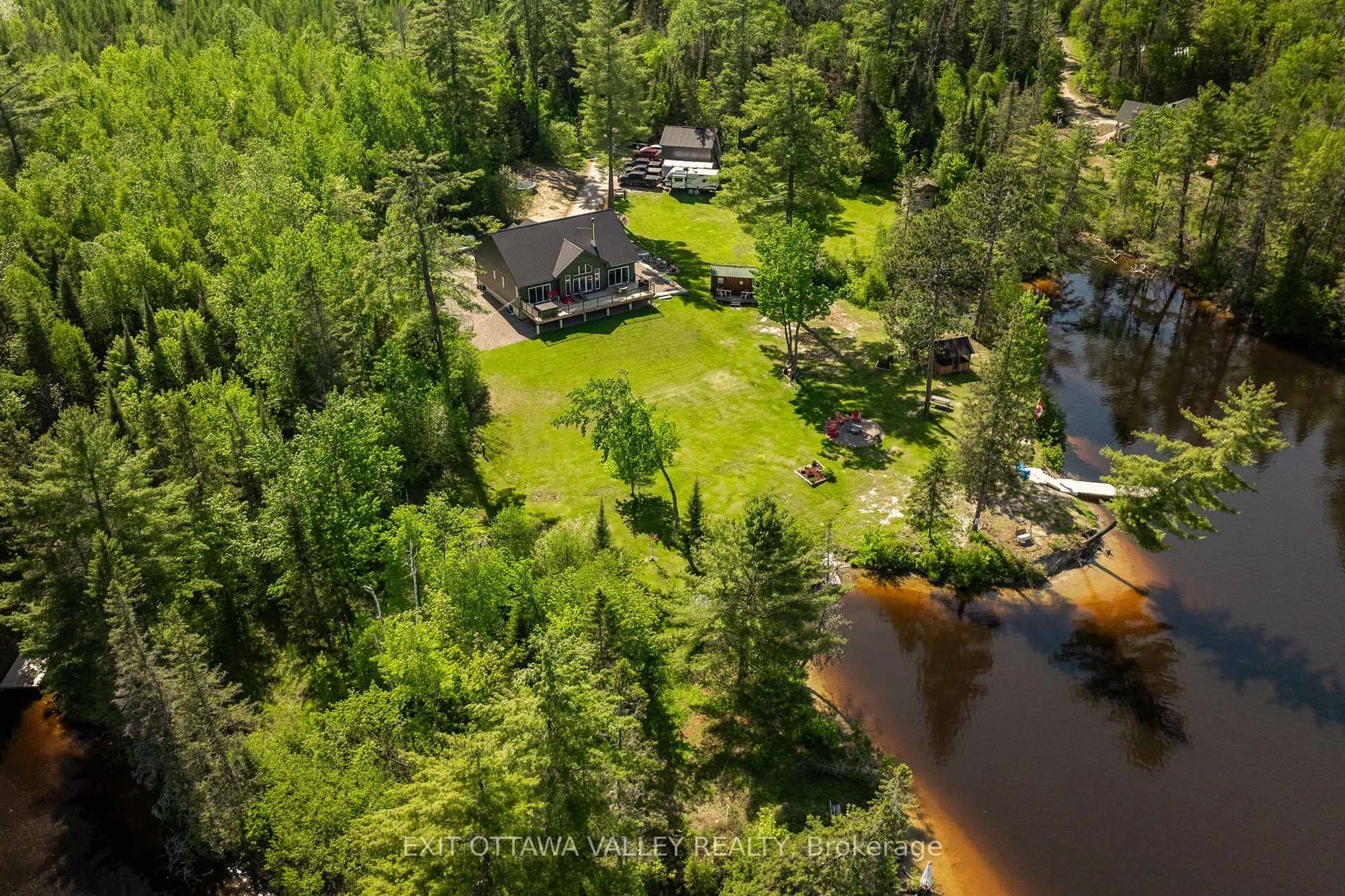 A pic from outside/outdoor area/front of a property/back of a property/a pic from drone, water/lake/river/ocean view for 82 Jennings Rd, Mackey Ontario K0J 2B0
