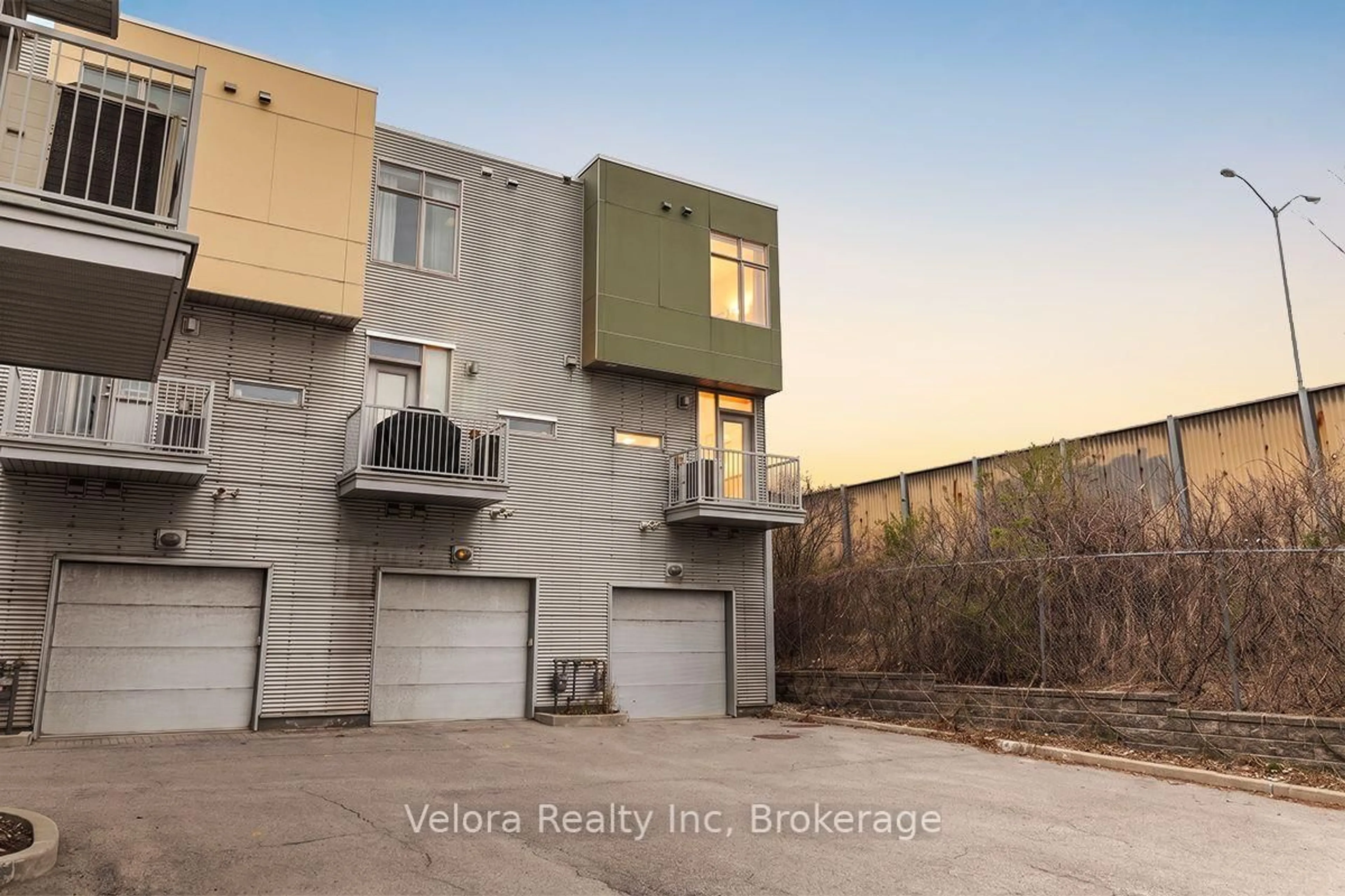 A pic from outside/outdoor area/front of a property/back of a property/a pic from drone, street for 63F Young St, Ottawa Ontario K1S 5T5