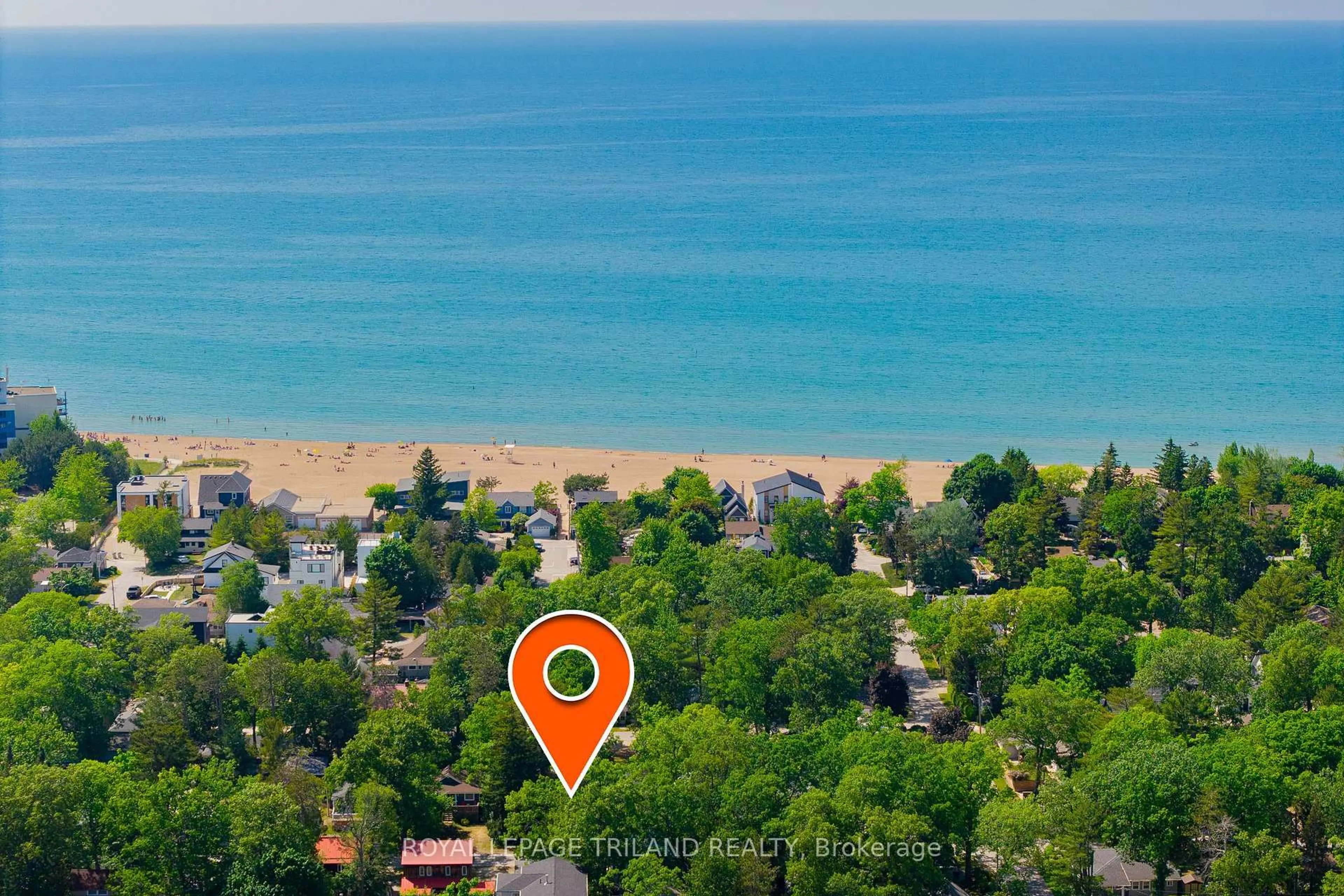 A pic from outside/outdoor area/front of a property/back of a property/a pic from drone, water/lake/river/ocean view for 26 Elmwood Ave, Lambton Shores Ontario N0M 1T0