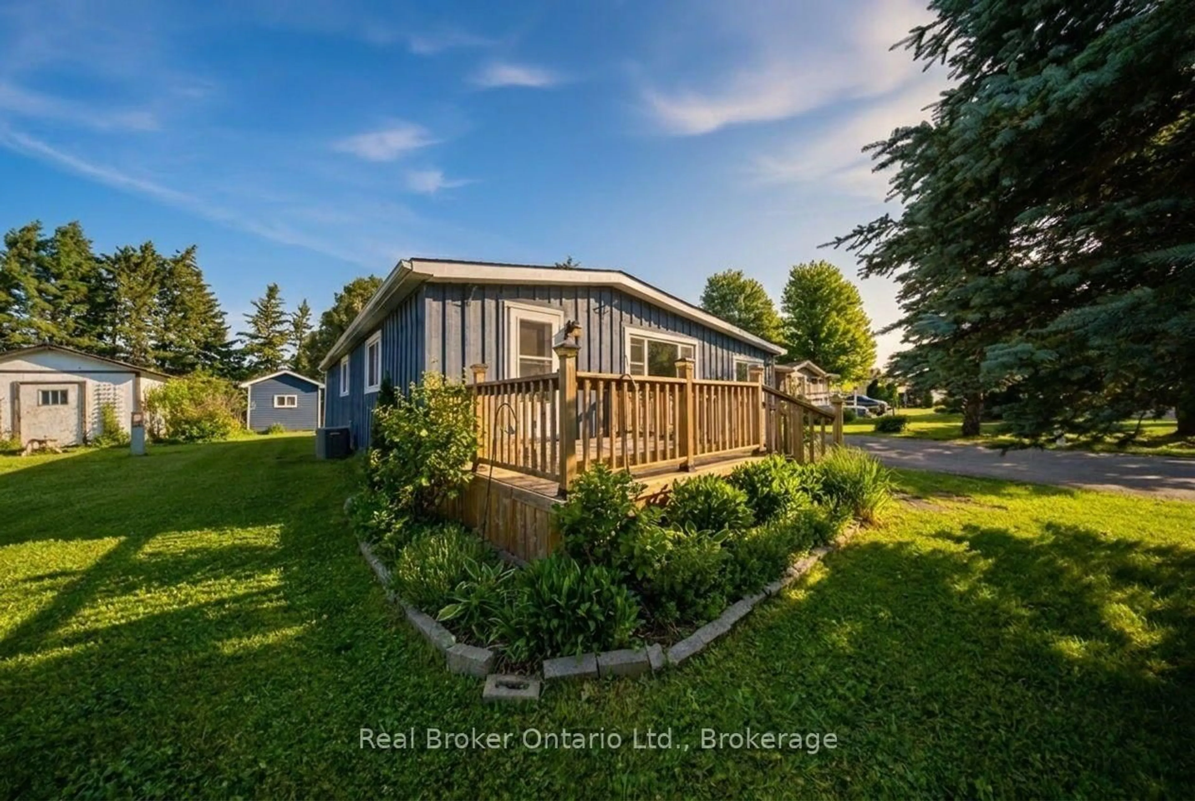 A pic from outside/outdoor area/front of a property/back of a property/a pic from drone, water/lake/river/ocean view for 105 Meadows Dr, West Grey Ontario N4N 3B8